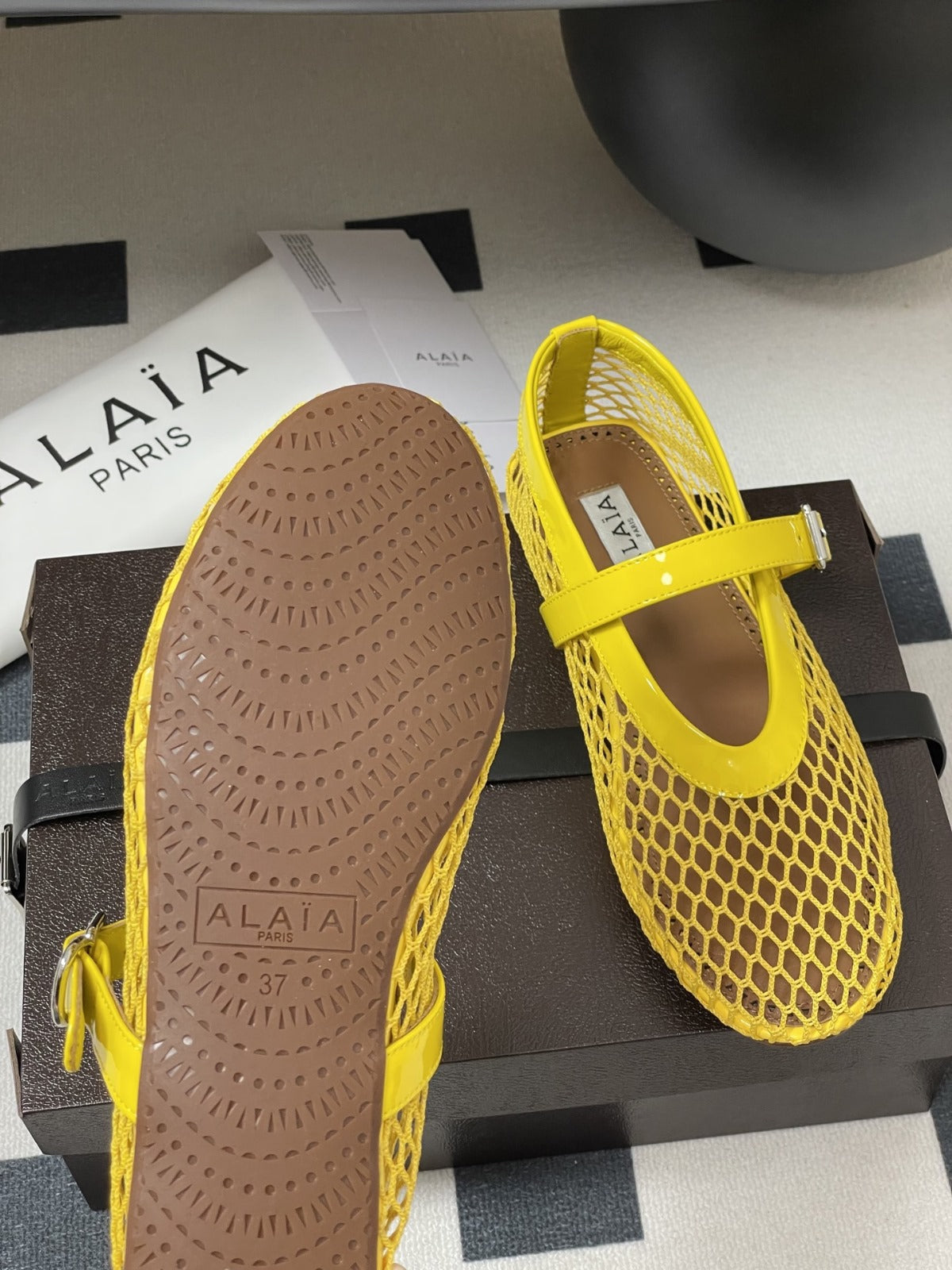 ALAIA BALLET FLATS IN YELLOW MESH FISHNET