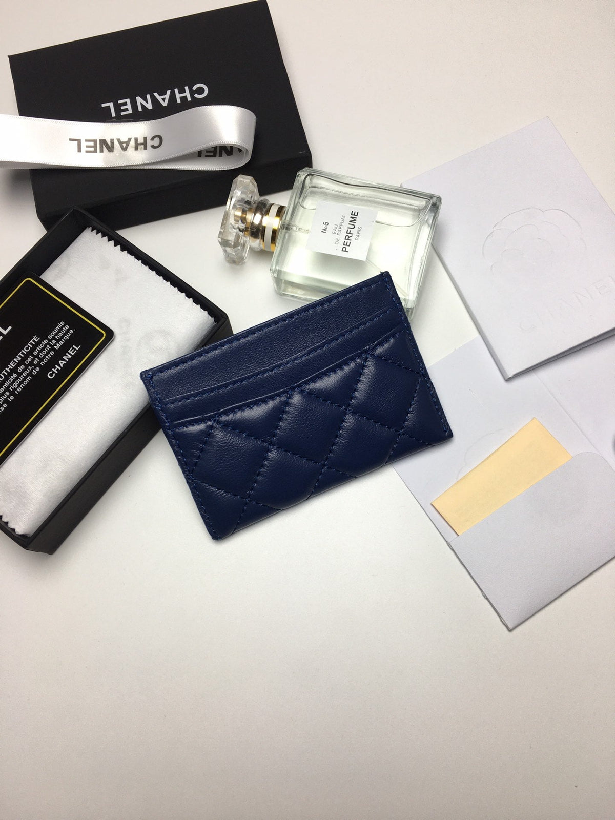 CC CARD HOLDER 11.2 NAVY CALFSKIN SILVER ICON