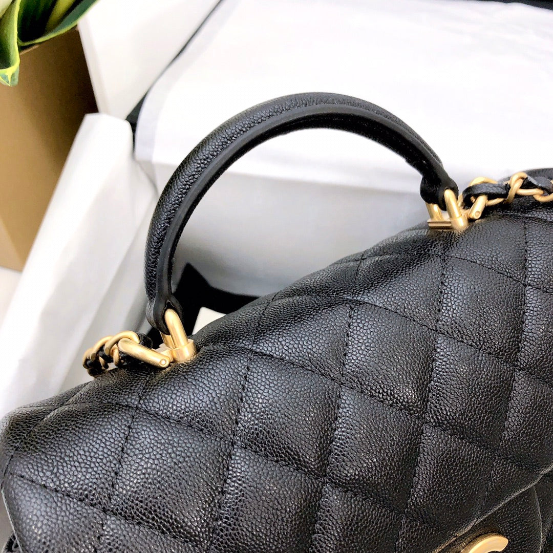 mini flap bag top handle 20cm black caviar gold hardware