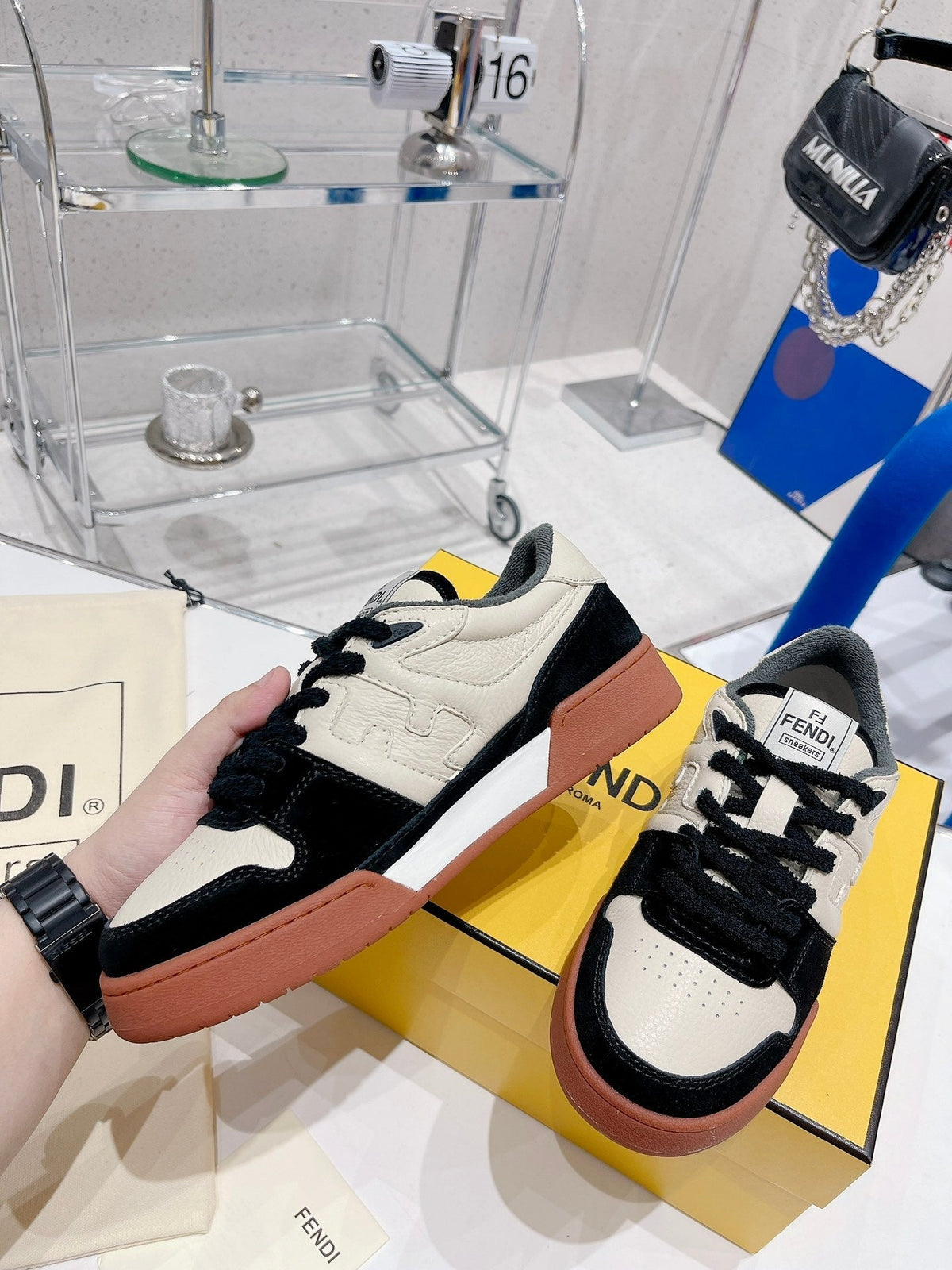 FENDI CASUAL SNEAKER IN WHITE CALFSKIN AND BLACK SUEDE