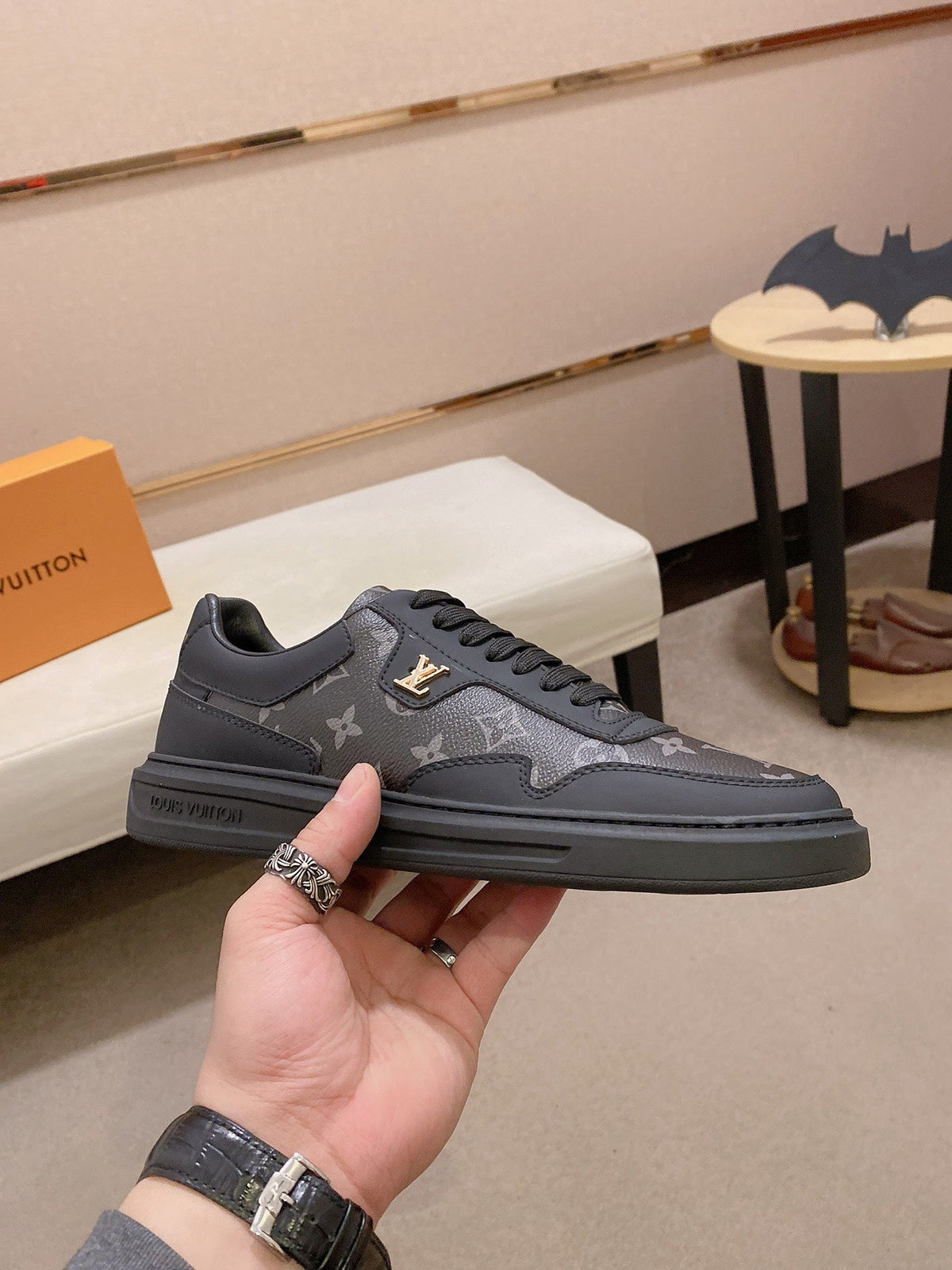 LV TRAINER IN BLACK MIX DARK BROWN CALFSKIN