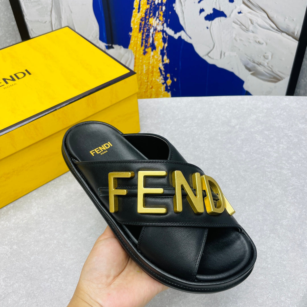 FENDI GRAPHY LOGO LETTERING SLIDES IN BLACK LAMBSKIN WITH GOLD HARDWARE