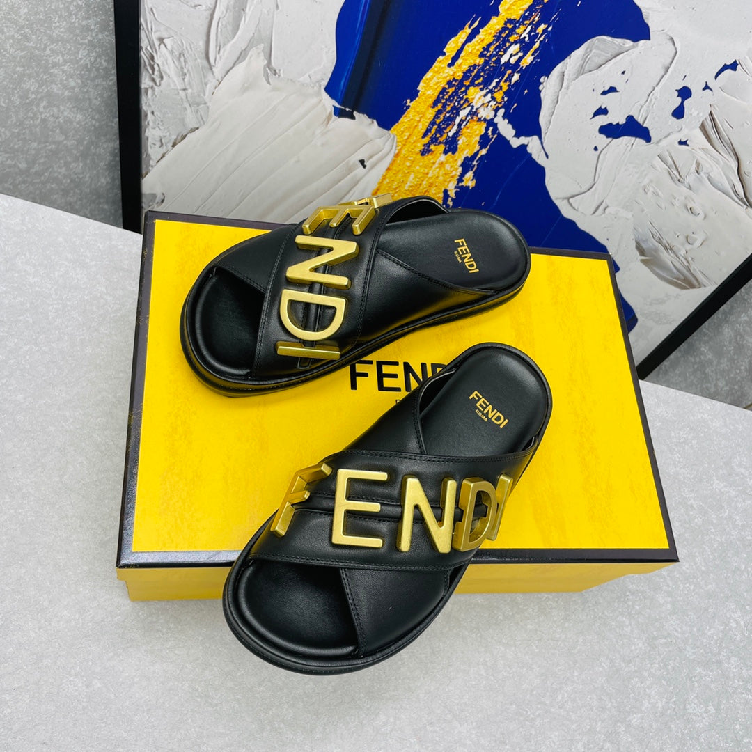 FENDI GRAPHY LOGO LETTERING SLIDES IN BLACK LAMBSKIN WITH GOLD HARDWARE