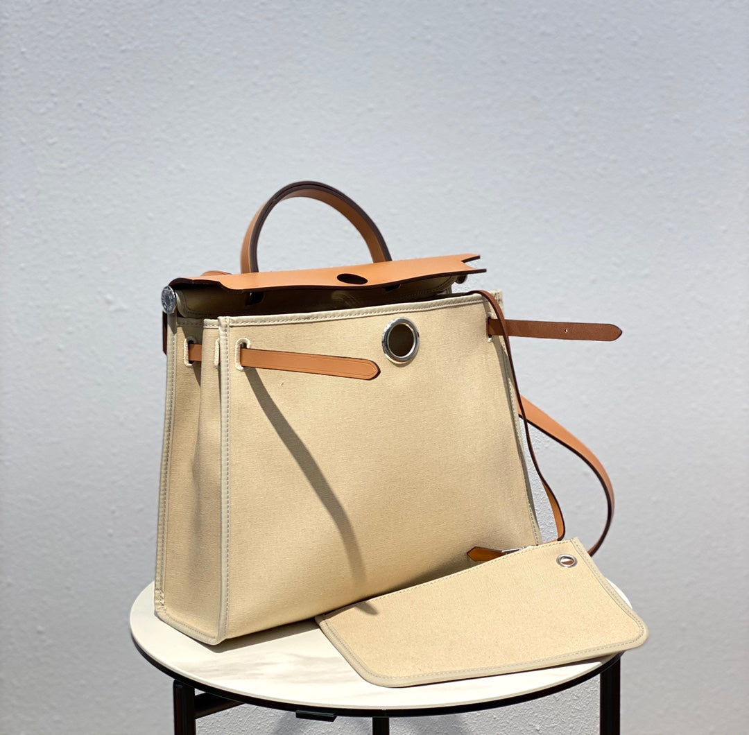 Herbag 31 Toile Light Beige Canvas Gold Cowhide Leather