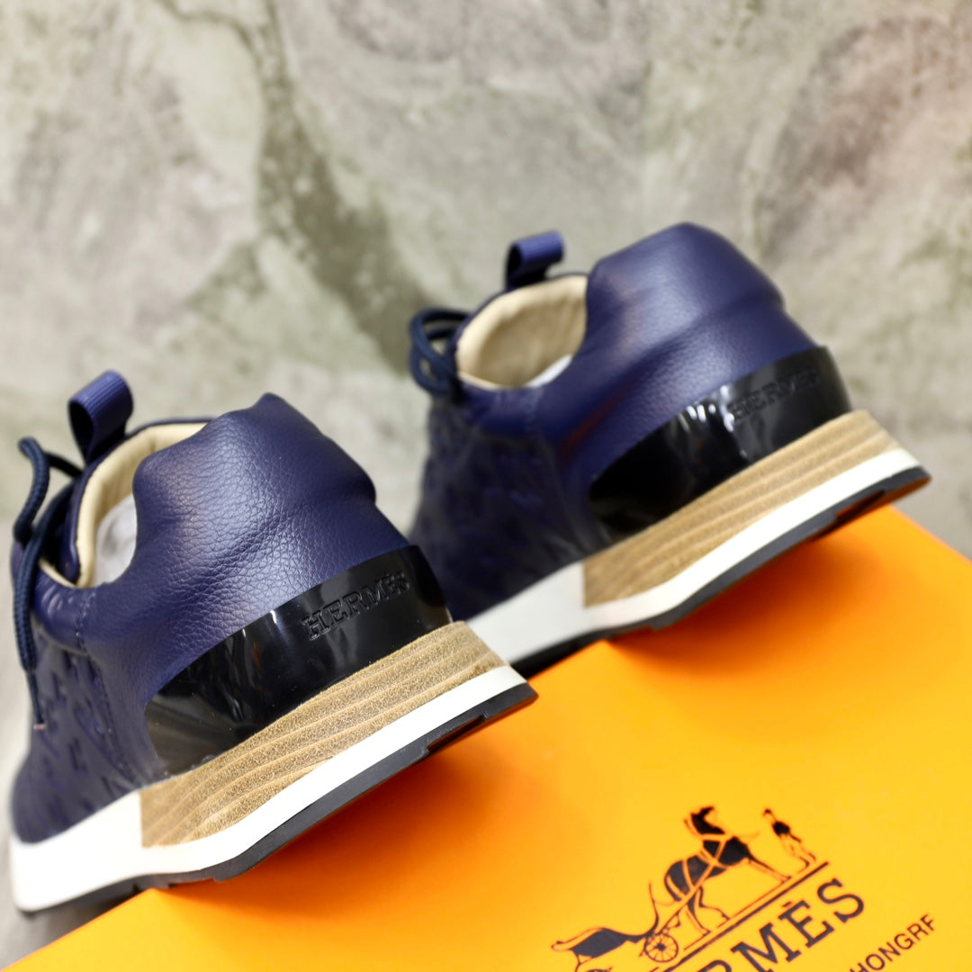 HM EMBOSSED ICON SNEAKER NAVY CALFSKIN