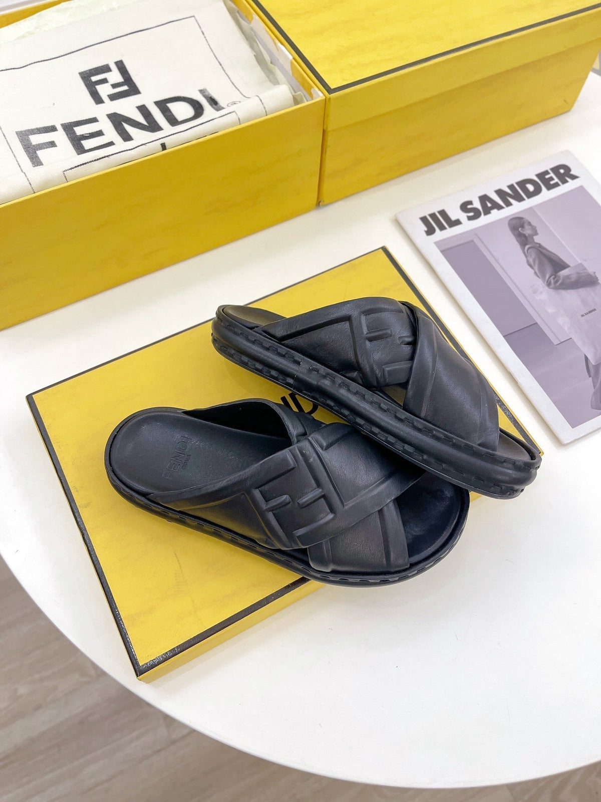 FENDI CROSSOVER SLIPPER IN BLACK CALFSKIN