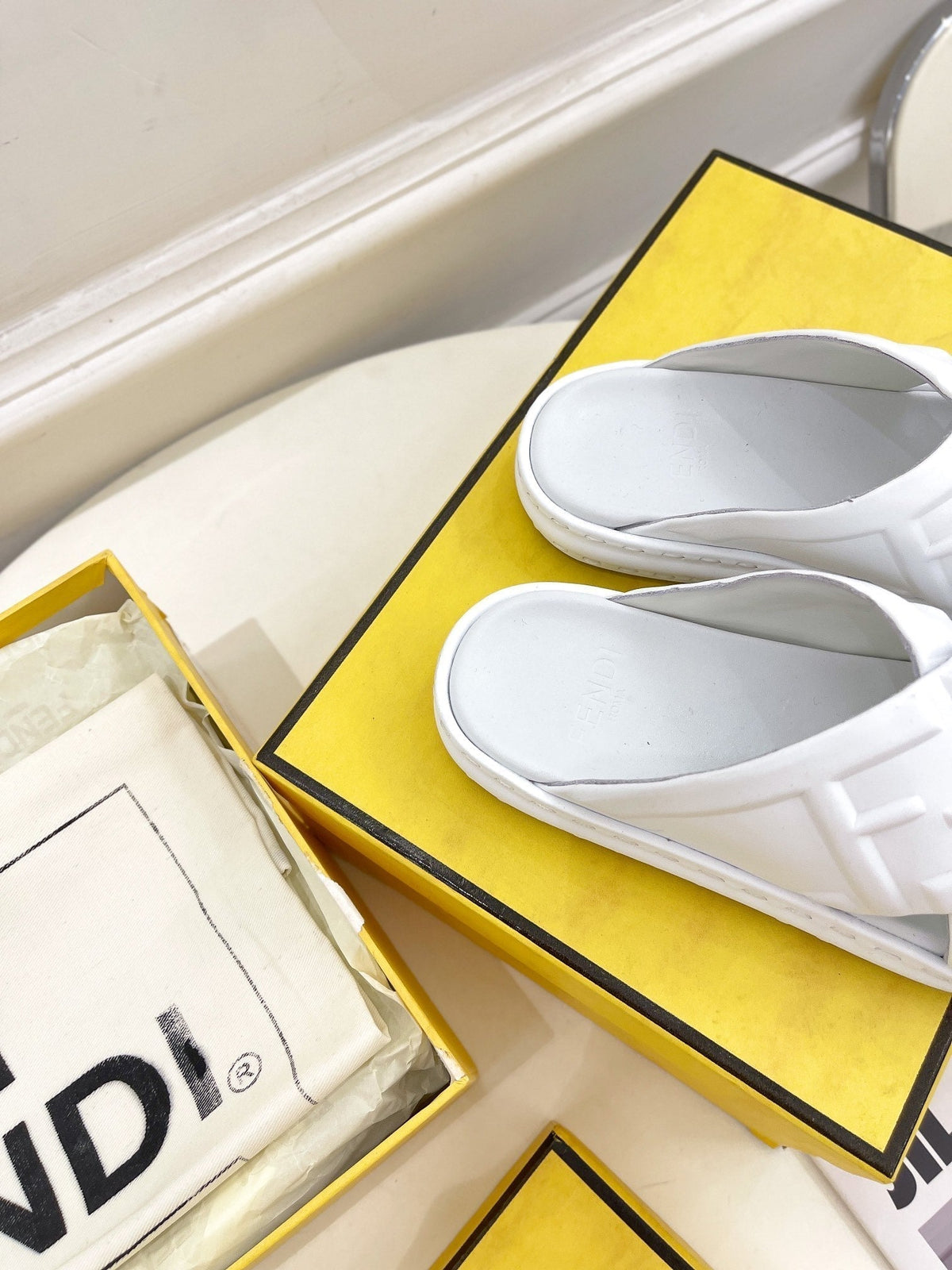 FENDI CROSSOVER SLIPPER IN WHITE CALFSKIN