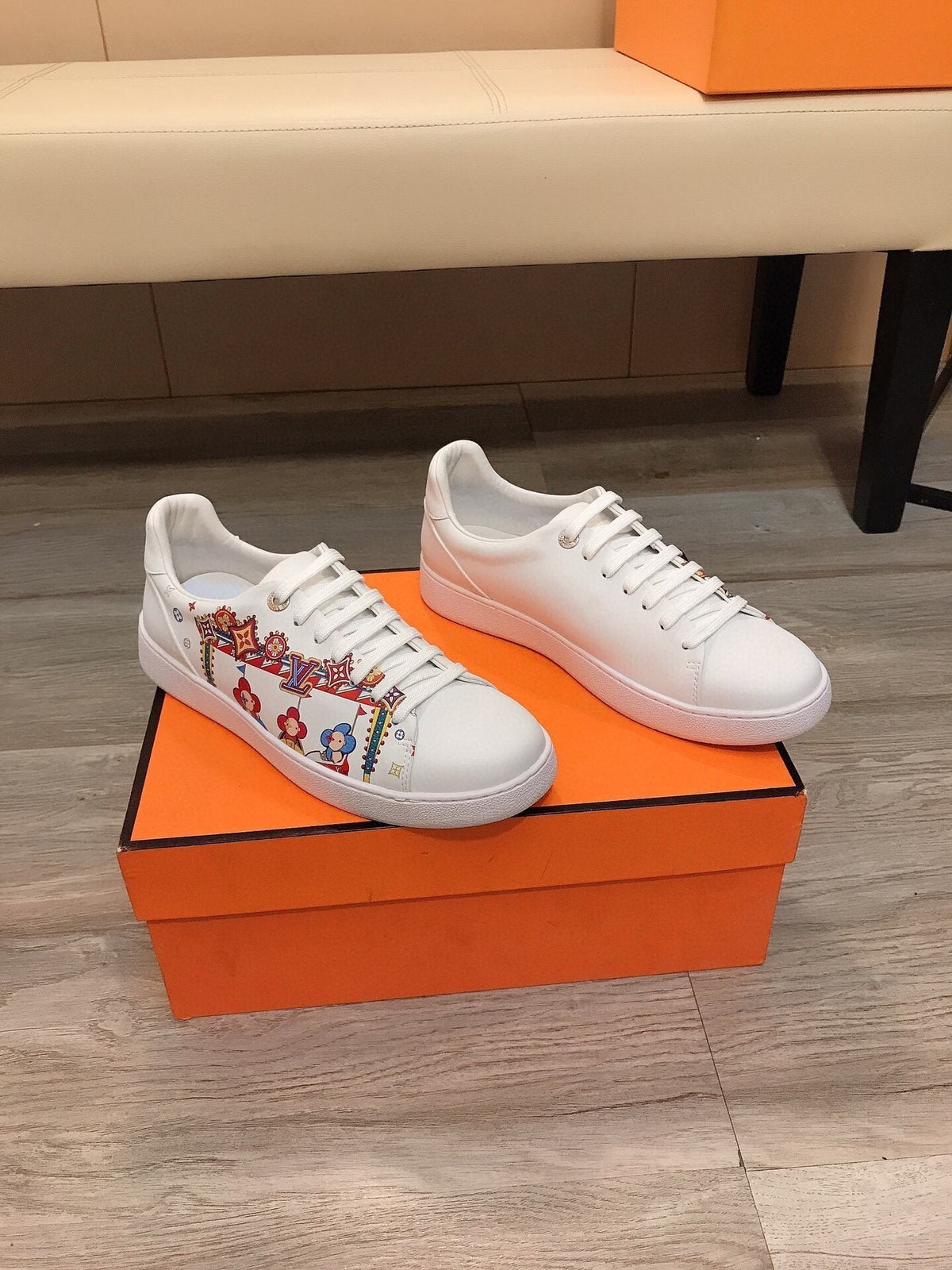 LV TRAINER WHITE CALFSKIN WITH COLORFUL PATTERN