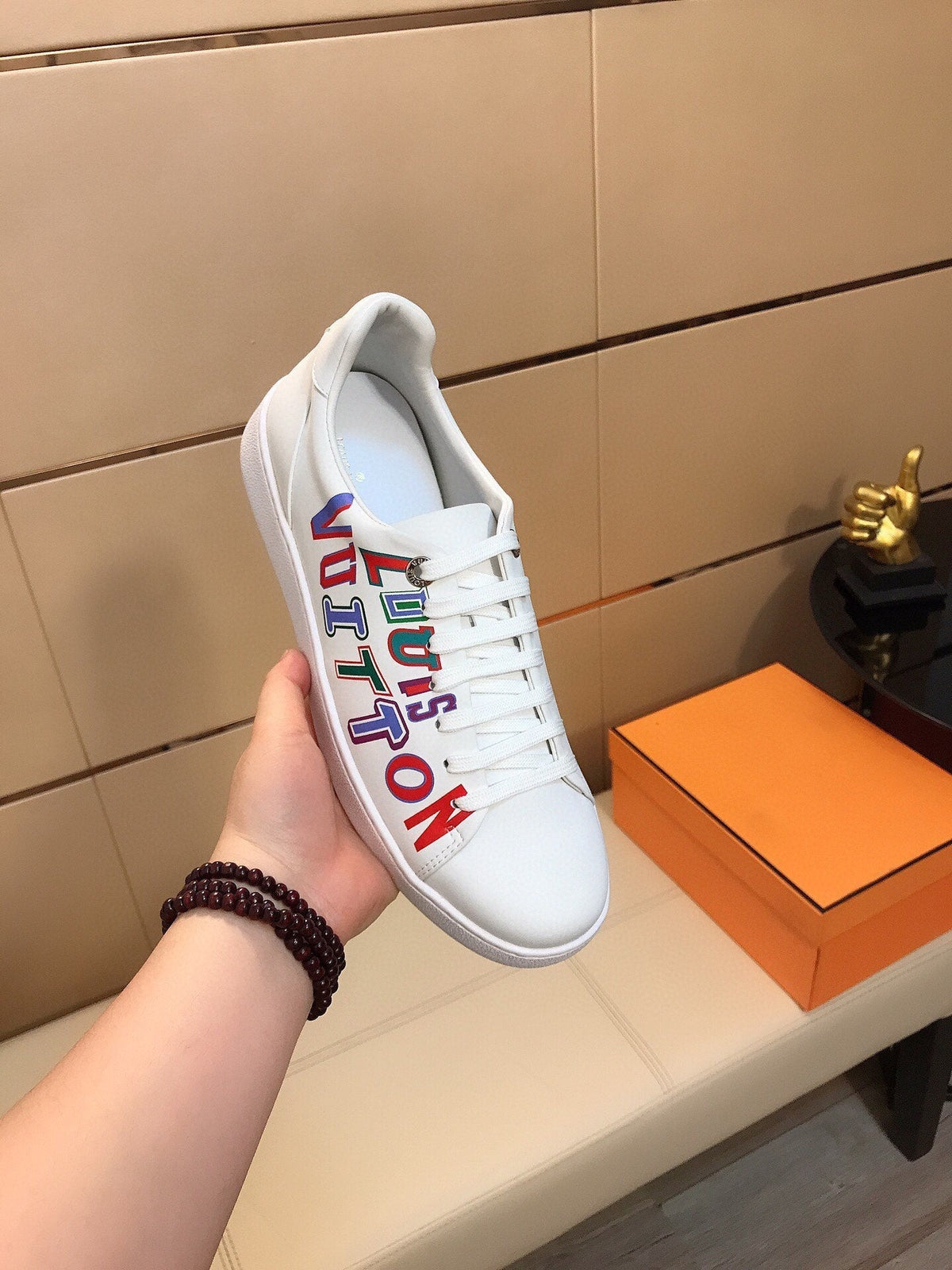 LV TRAINER WHITE CALFSKIN WITH COLORFUL LOGO