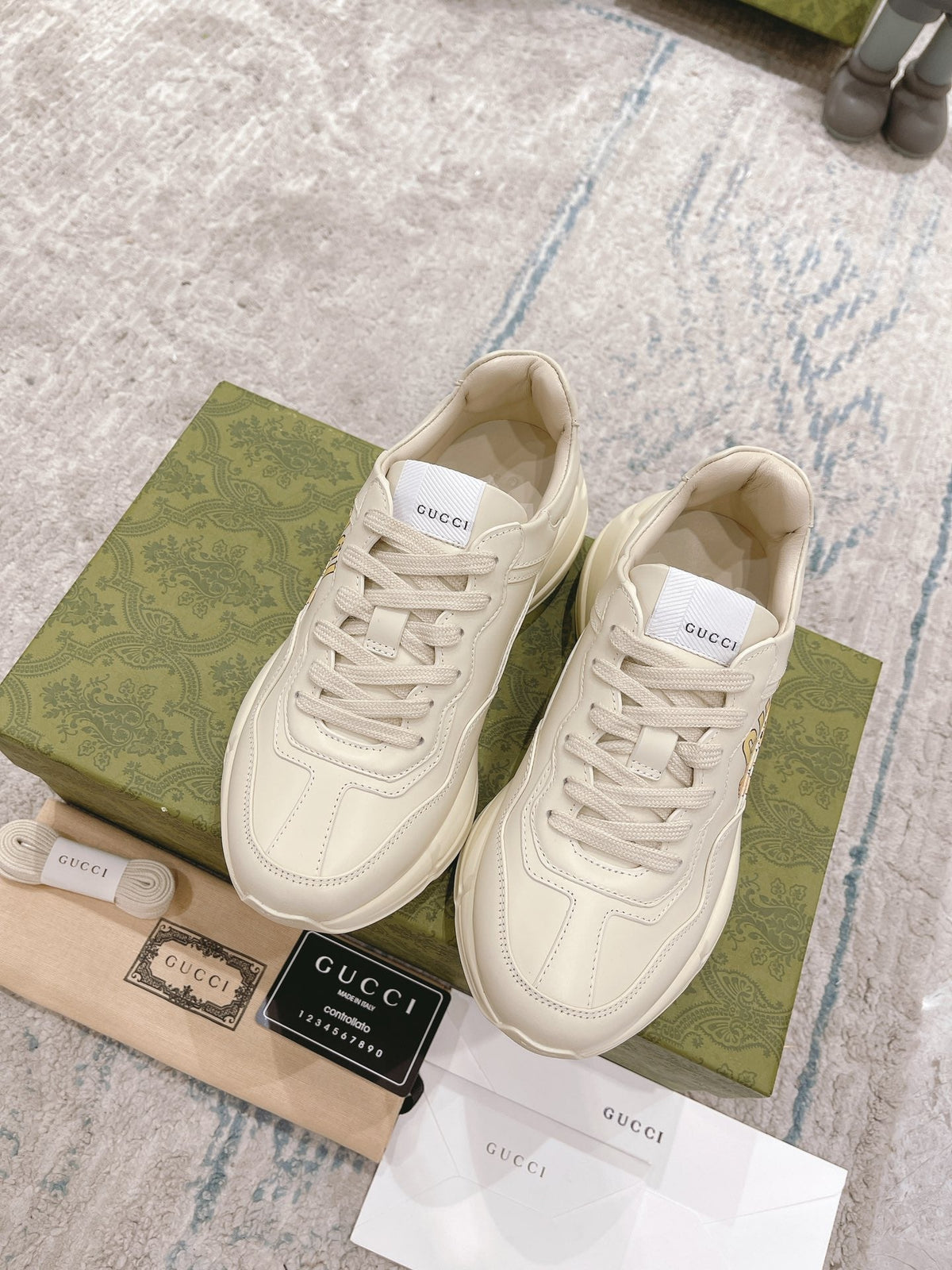 Gucci 2026 Rhyton Sneakers Ivory Cowhide With Cat Print Motif 988663