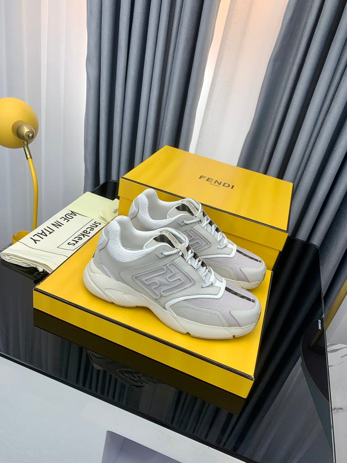 FENDI FASTER TRAINER IN GREY CALFSKIN AND SUEDE