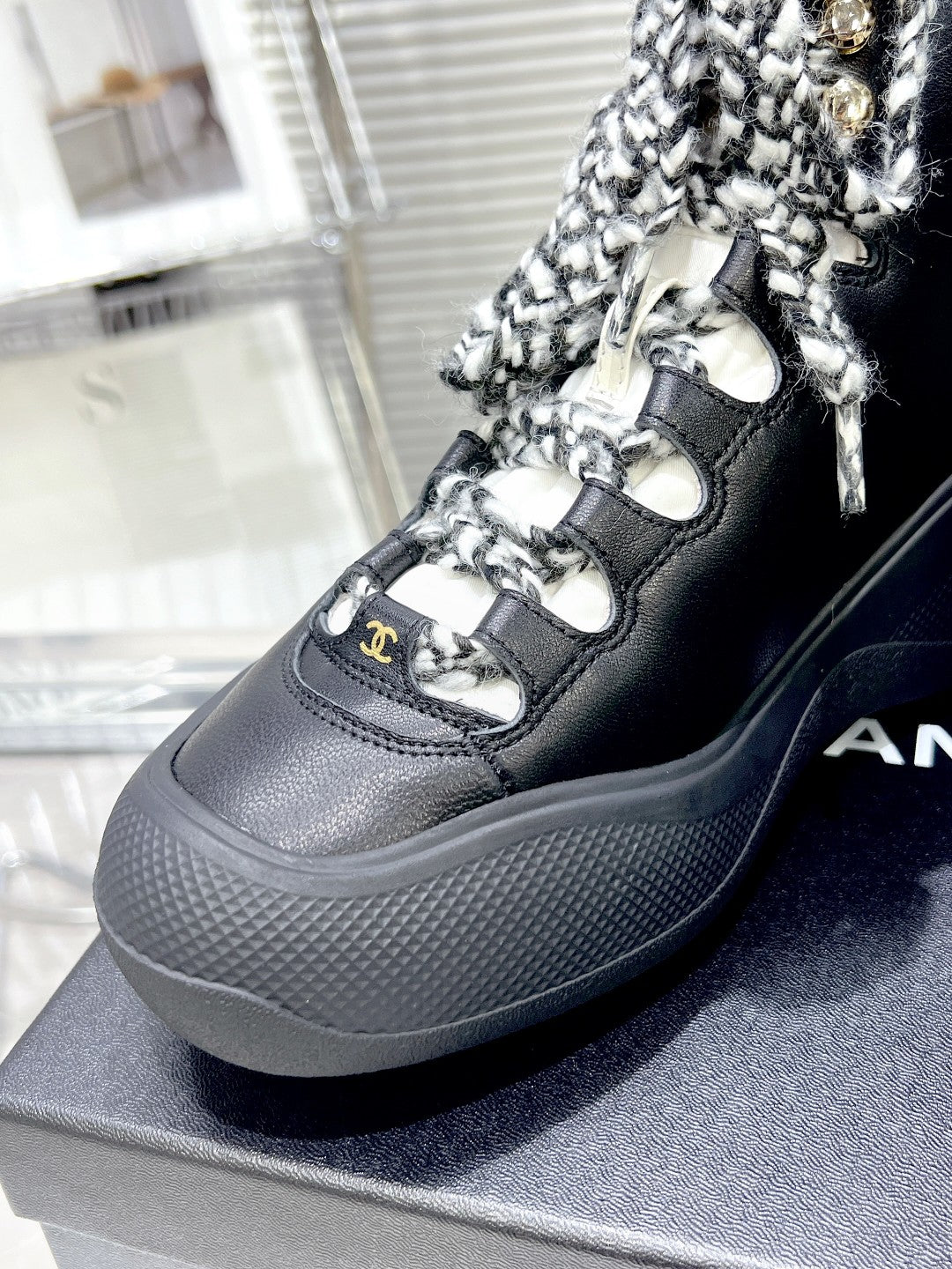 CC CANO ALTO SNEAKER IN BLACK CALFSKIN AND RUBBER