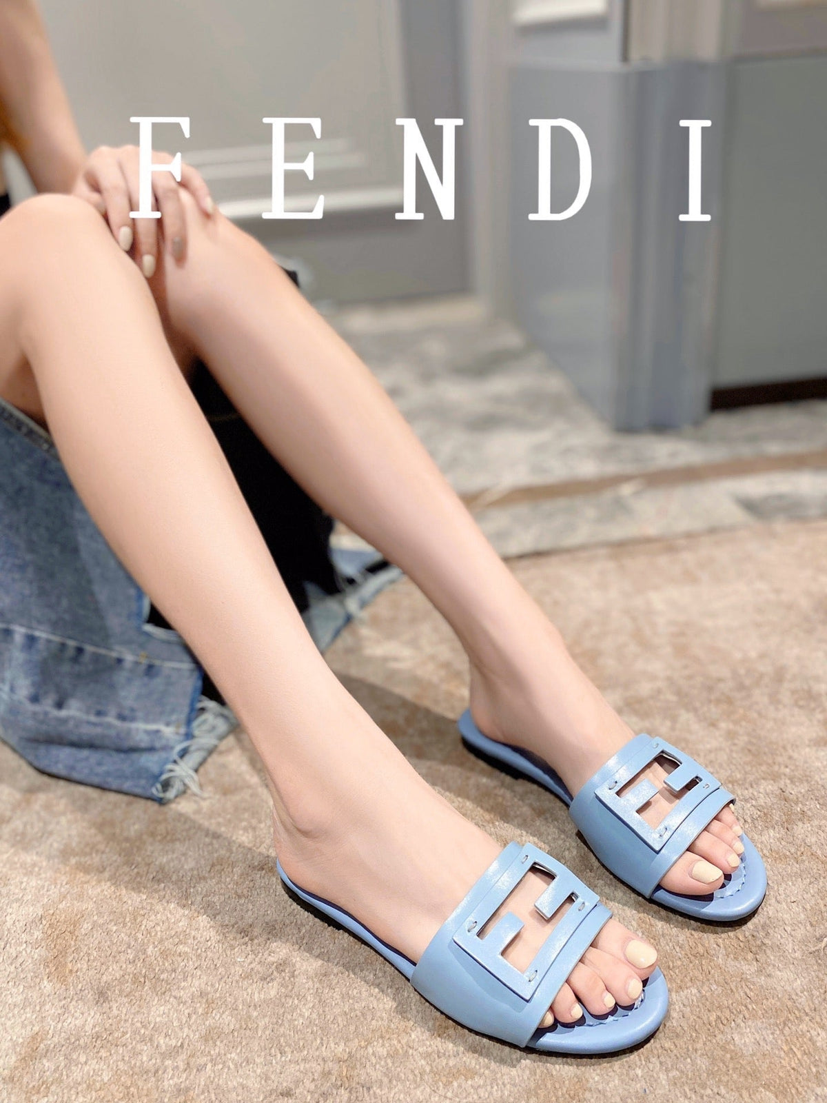 FENDI BAGUETTE SLIDES IN  BABY BLUE LAMBSKIN