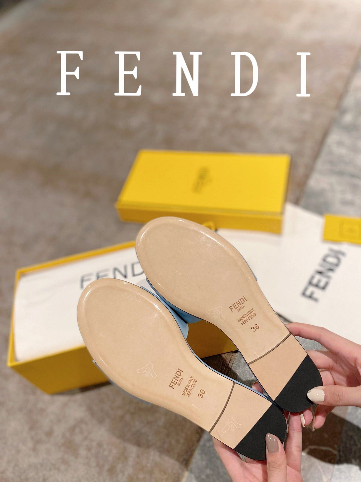 FENDI BAGUETTE SLIDES IN  BABY BLUE LAMBSKIN