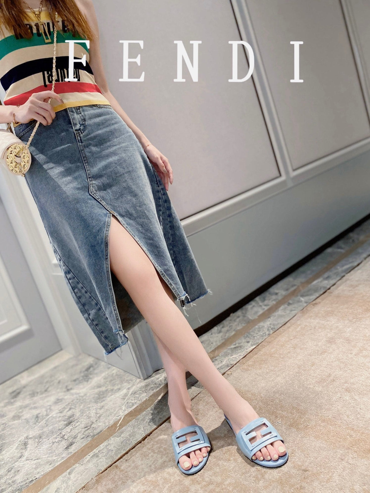 FENDI BAGUETTE SLIDES IN  BABY BLUE LAMBSKIN