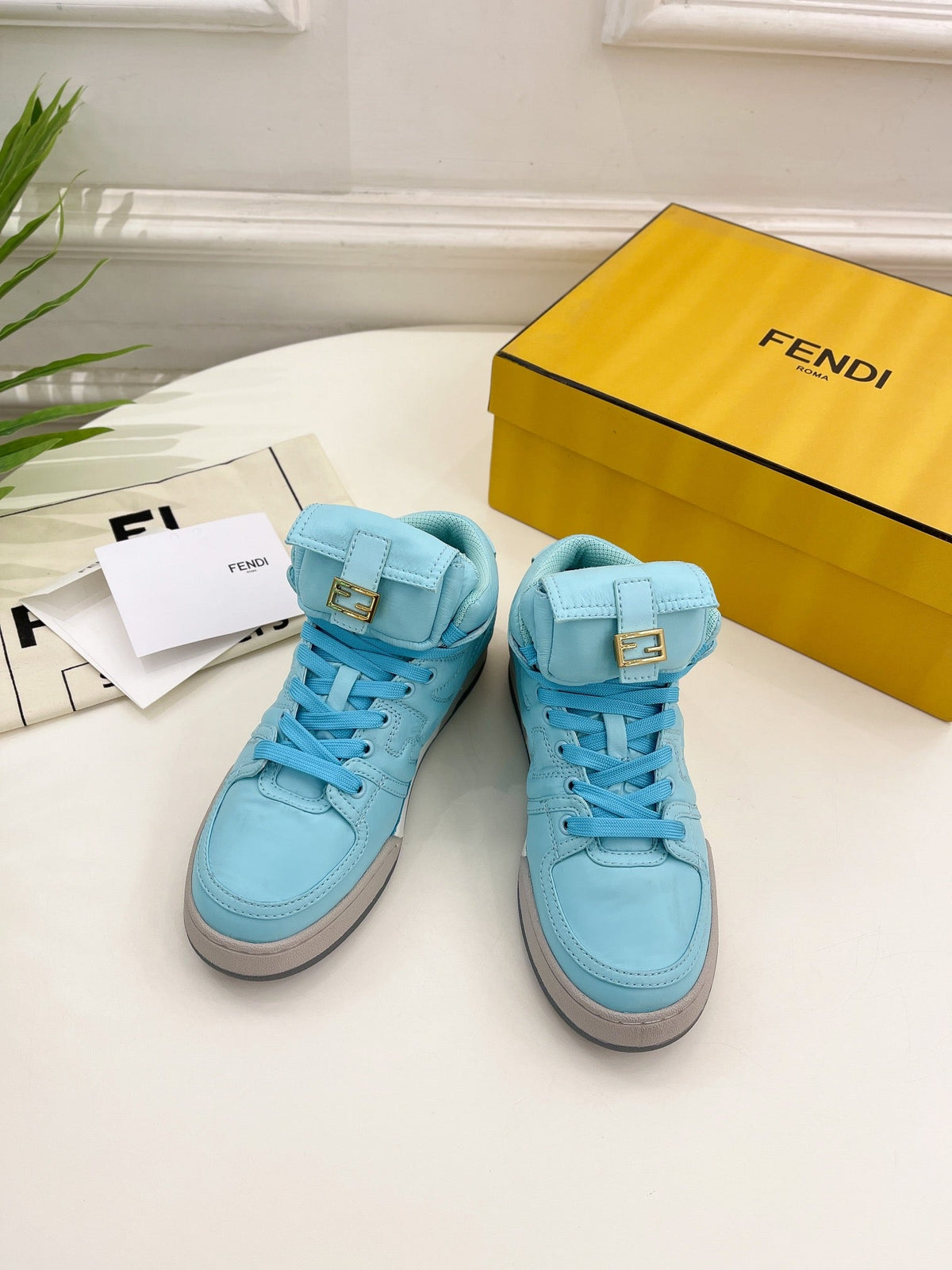 FENDI LOGO SOCK SNEAKER BOOTS IN SKY BLUE LAMBSKIN