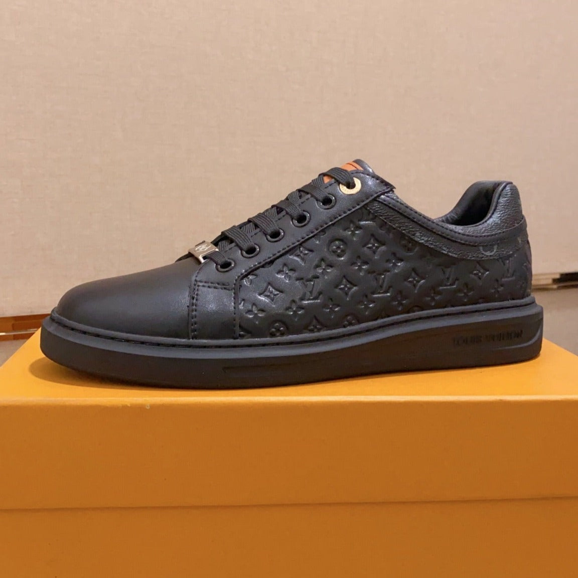 LV RIVOLI SNEAKER BLACK MINI MONOGRAM-EMBOSSED CALFSKIN