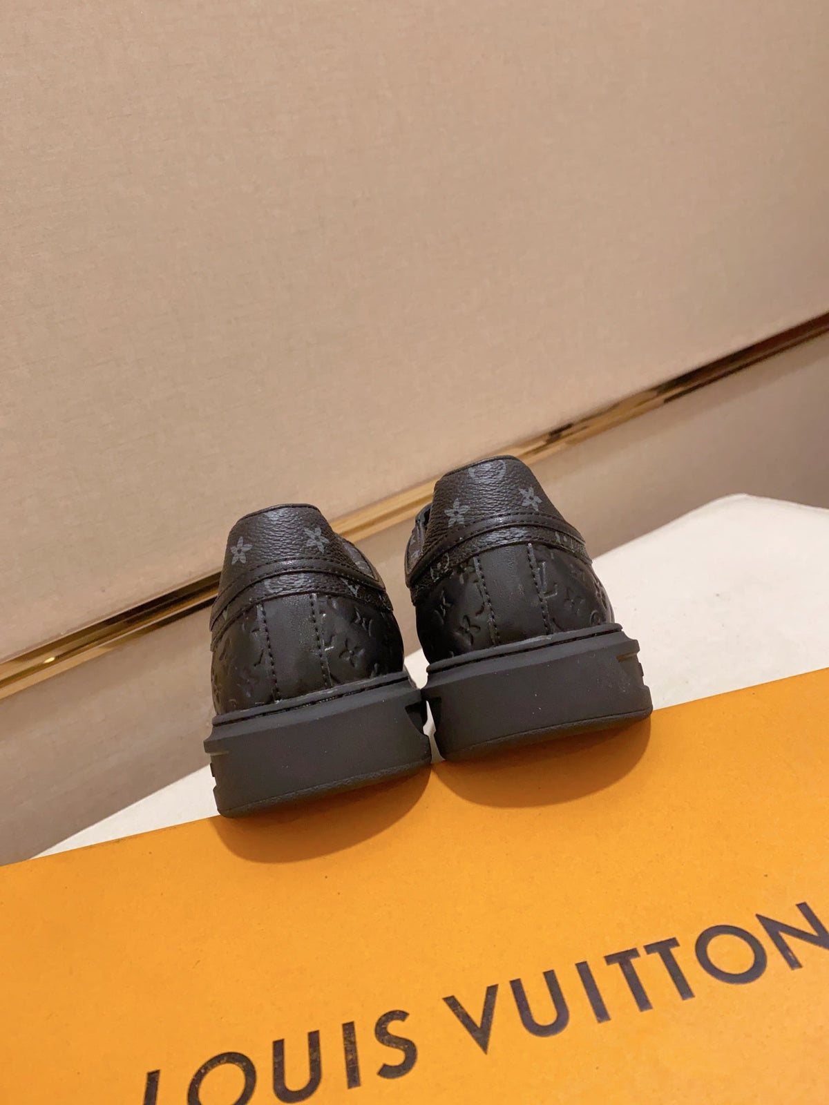 LV RIVOLI SNEAKER BLACK MINI MONOGRAM-EMBOSSED CALFSKIN