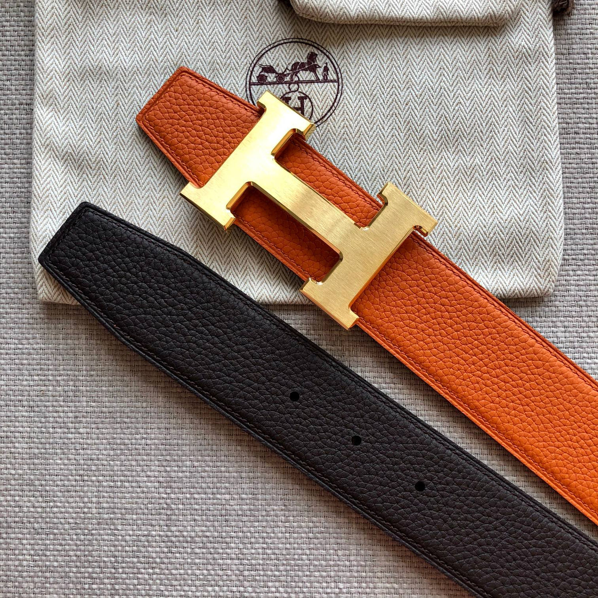 HM BELT BUCKLE & REVERSIBLE BLACK AND ORANGE LEATHER STRAP 38MM GOLD HARDWARE