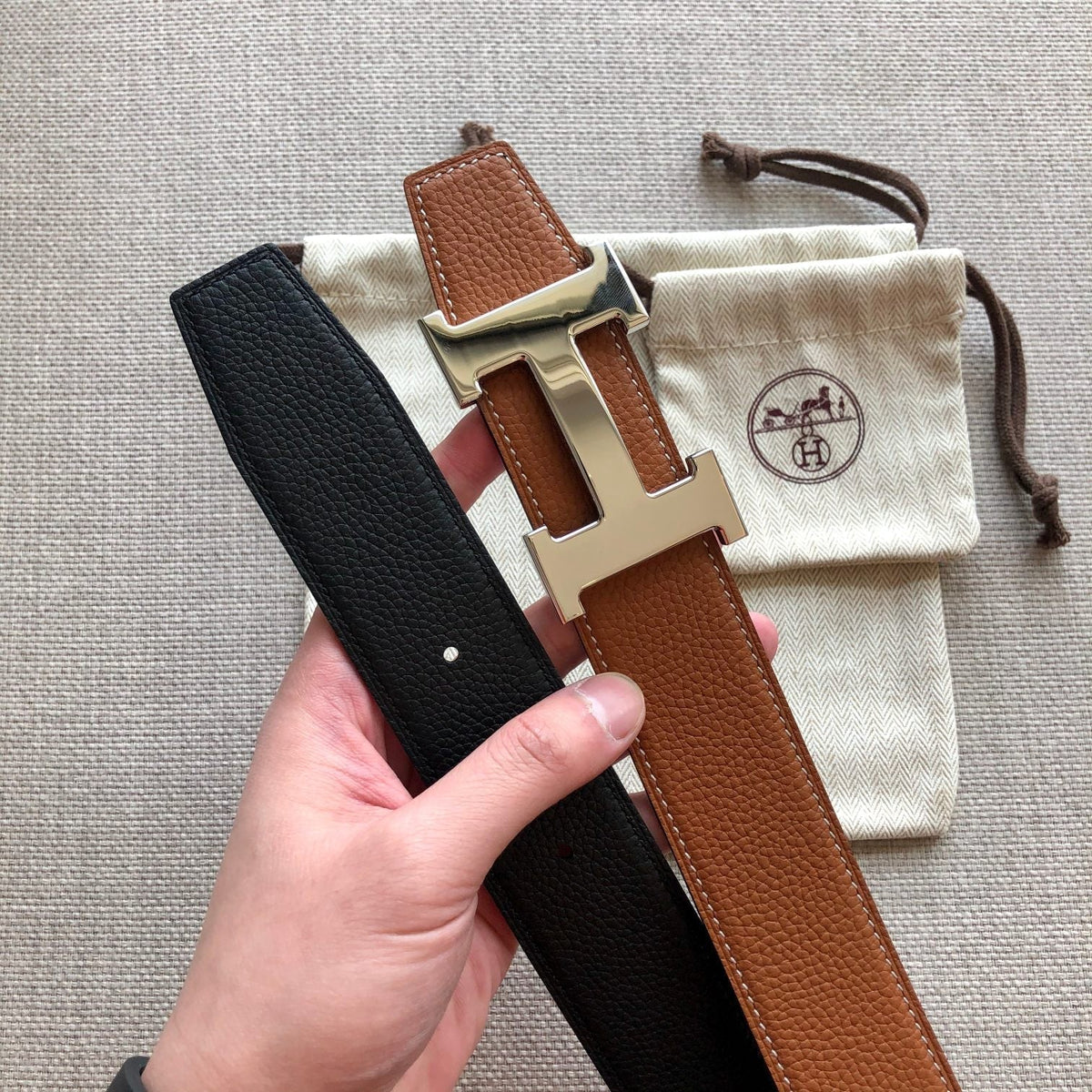 HM BELT BUCKLE & REVERSIBLE BLACK AND BRONZE BROWN LEATHER STRAP 38MM GOLD HARDWARE