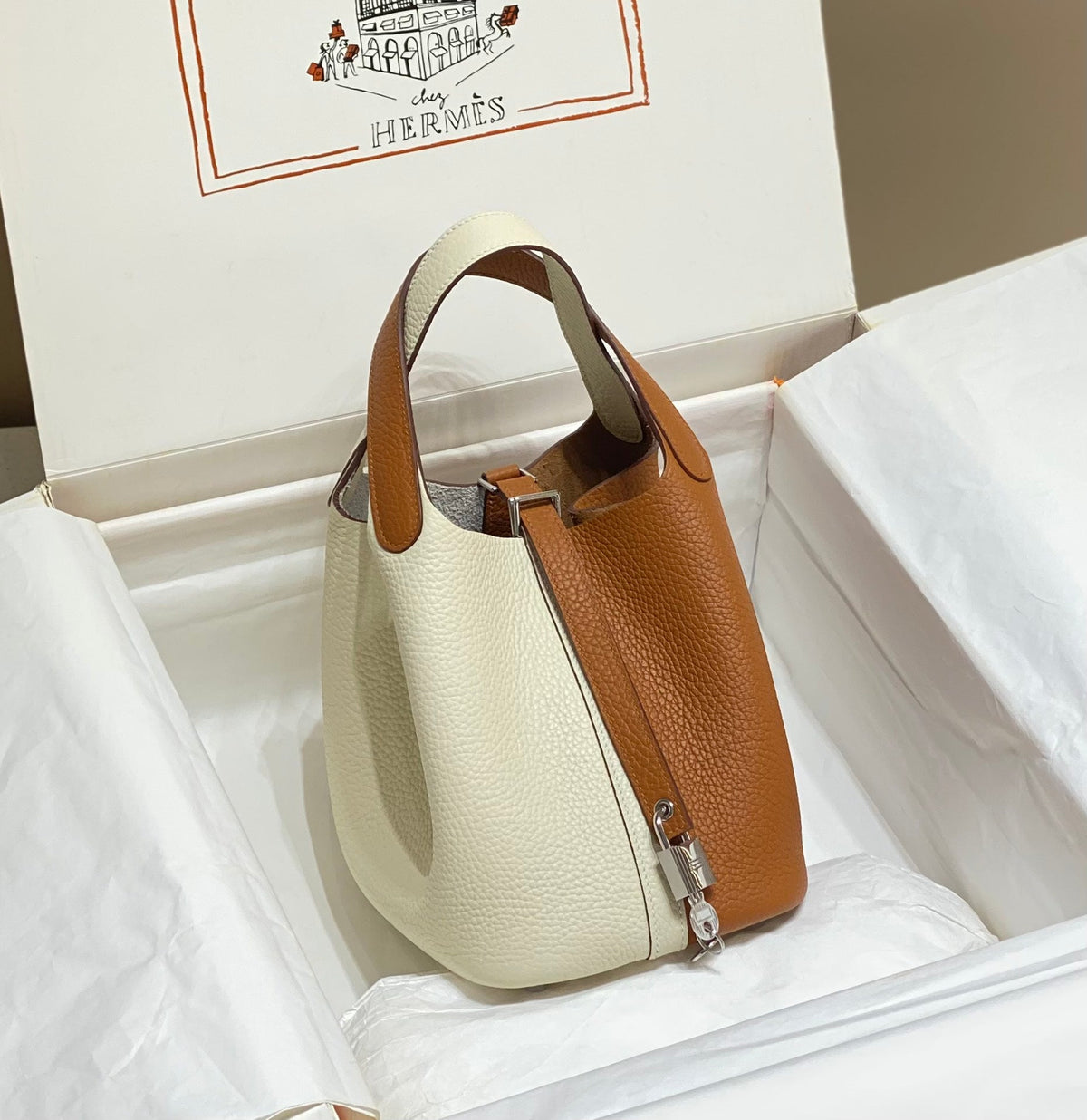 picotin lock 18 gold white togo shw