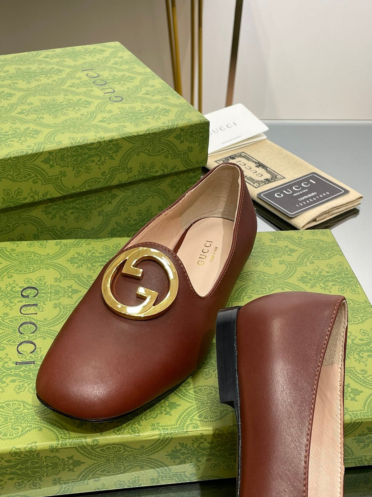 BLONDIE LOGO-PLAQUE LOAFERS IN SYRUP BROWN CALFSKIN