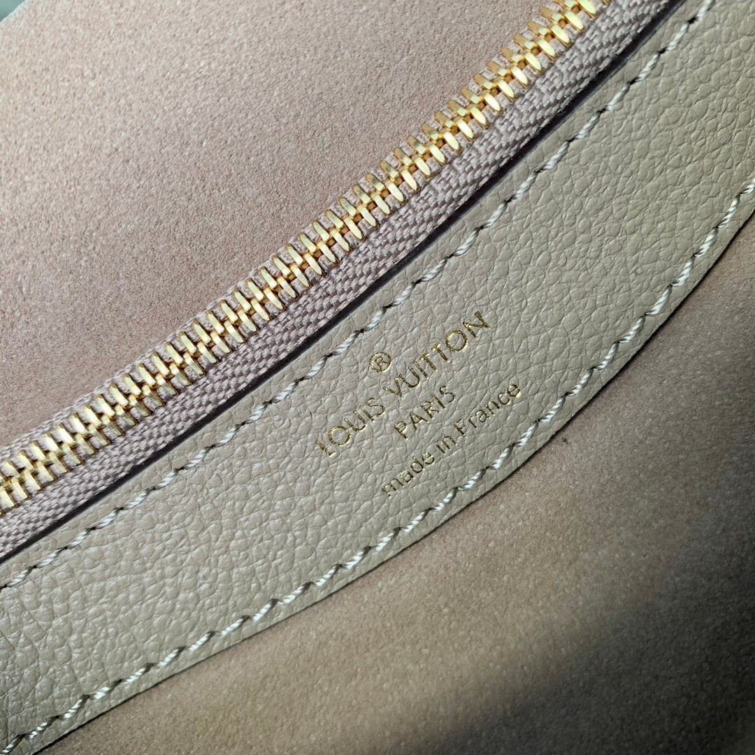 diane 24 dove cream biorcolor monogram empreinte leather