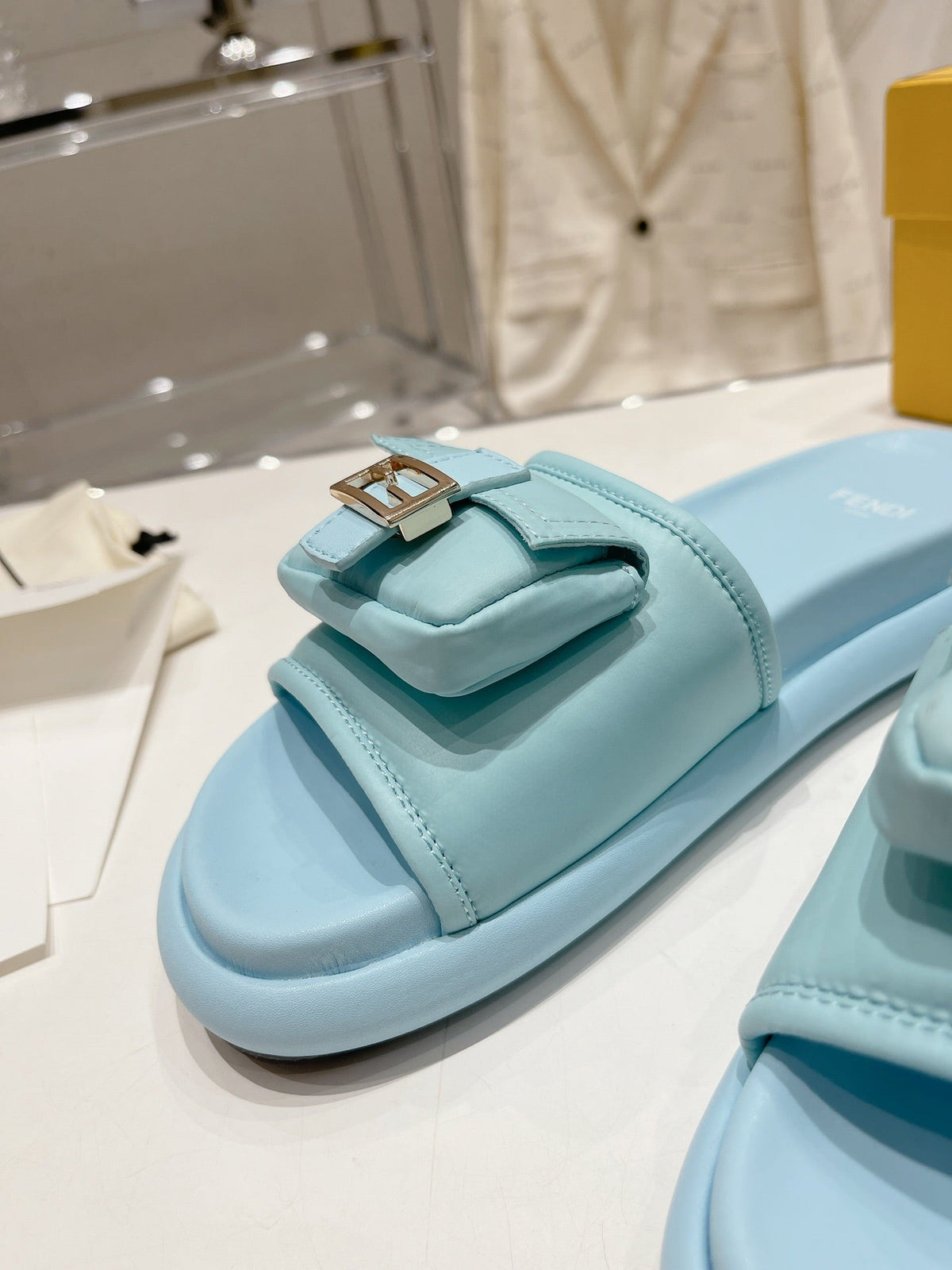 FENDI BAGUETTE SLIPPERS IN SKY BLUE LAMBSKIN WITH GOLD HARDWARE