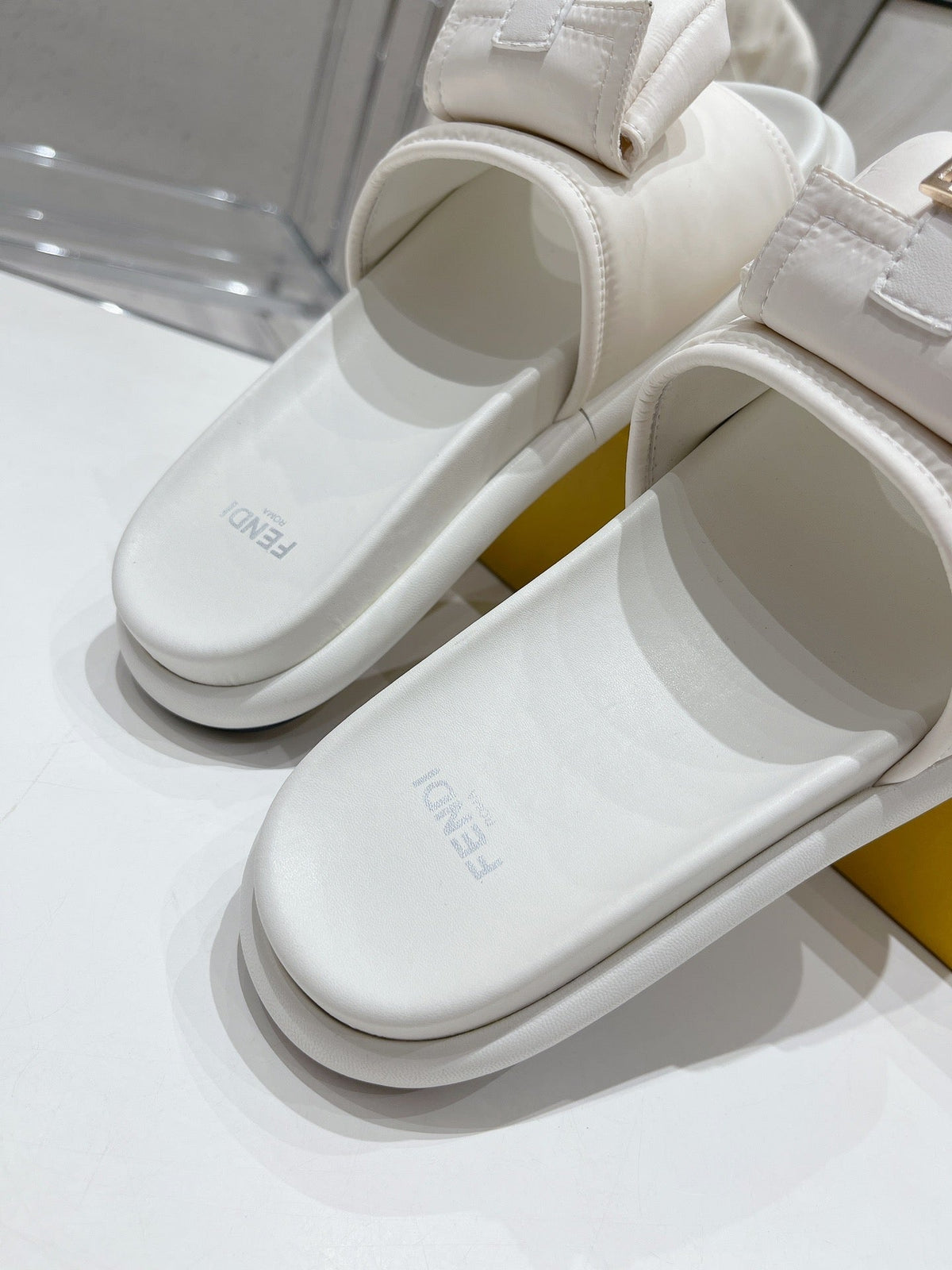 FENDI BAGUETTE SLIPPERS IN WHITE LAMBSKIN WITH GOLD HARDWARE