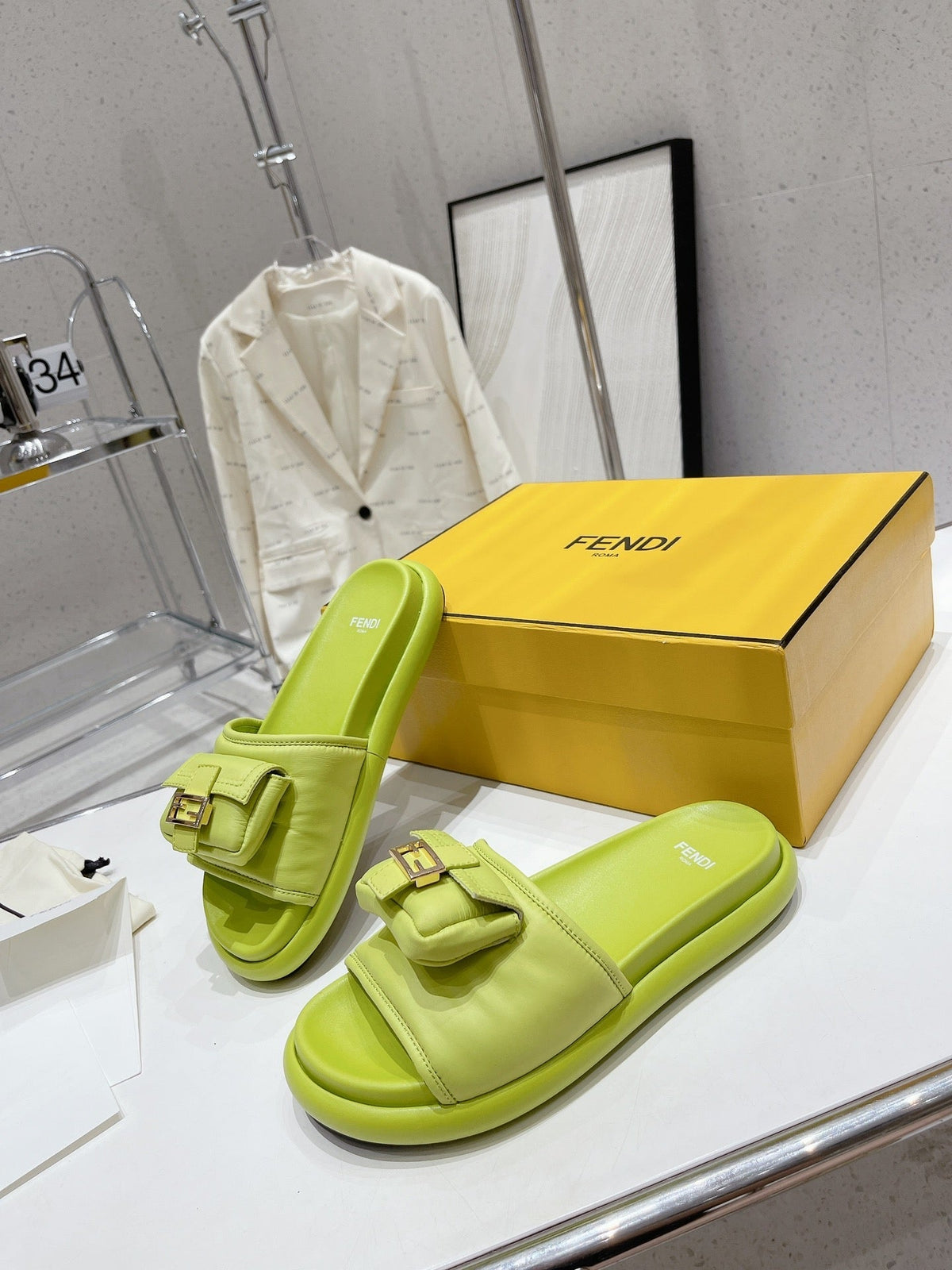 FENDI BAGUETTE SLIPPERS IN PEAR GREEN LAMBSKIN WITH GOLD HARDWARE