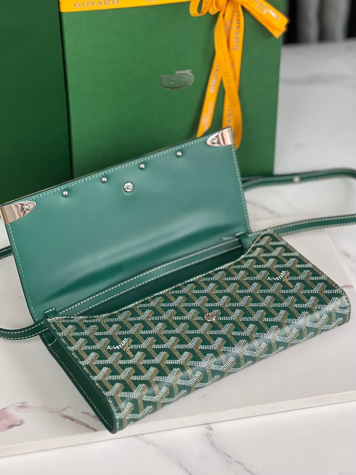 MONTE-CARLO PM CLUTCH 25 IN GREEN GOYARDINE CANVAS