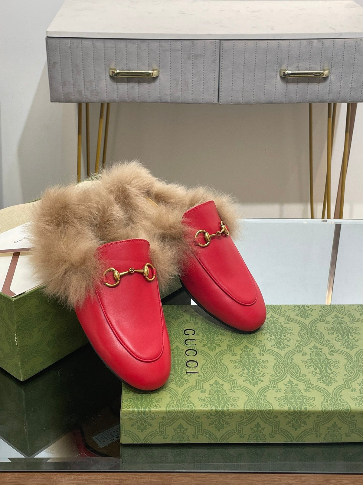 HORSEBIT MULE IN CHERRY RED CALFSKIN AND LAMB WOOL LINING
