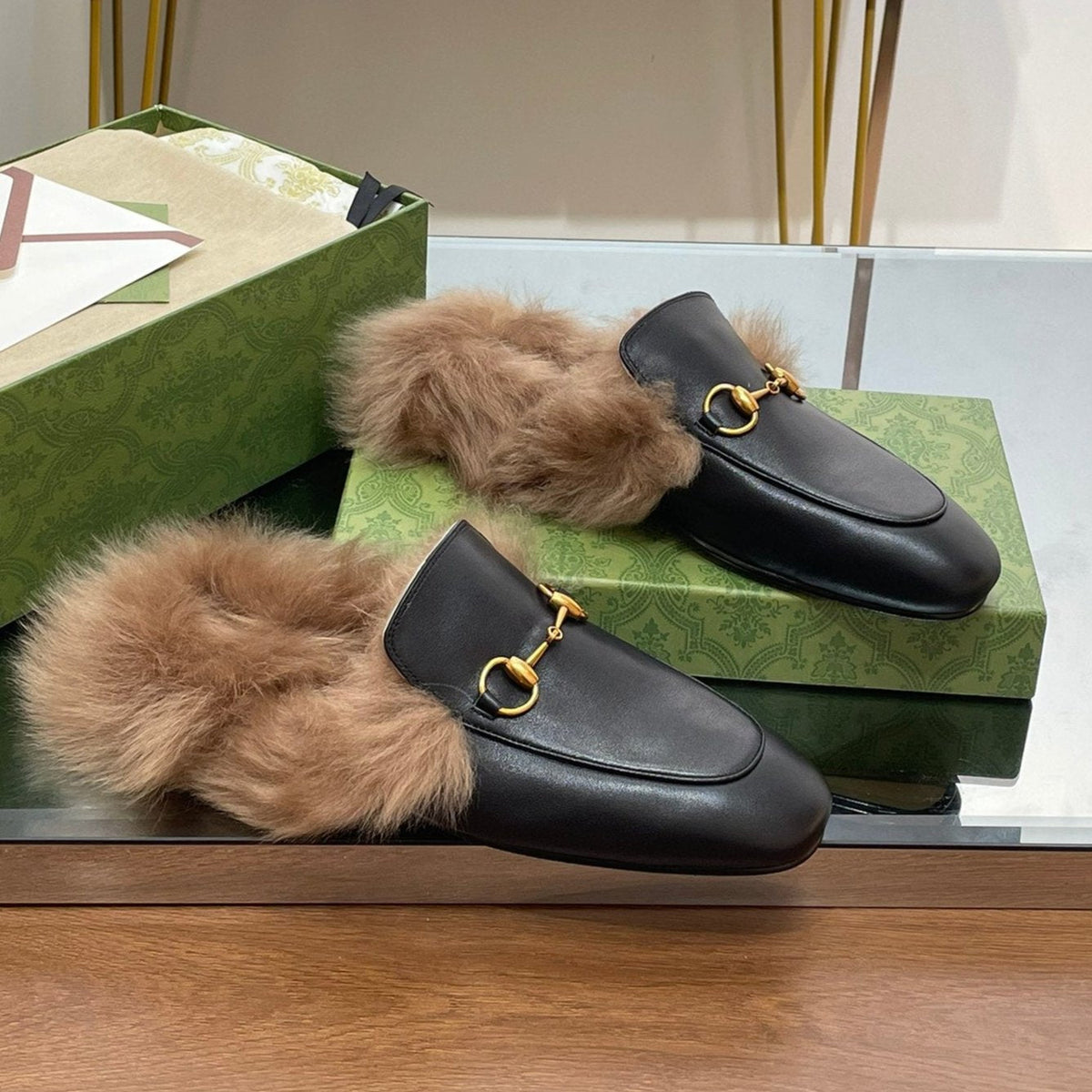 HORSEBIT MULE IN BLACK CALFSKIN AND LAMB WOOL LINING