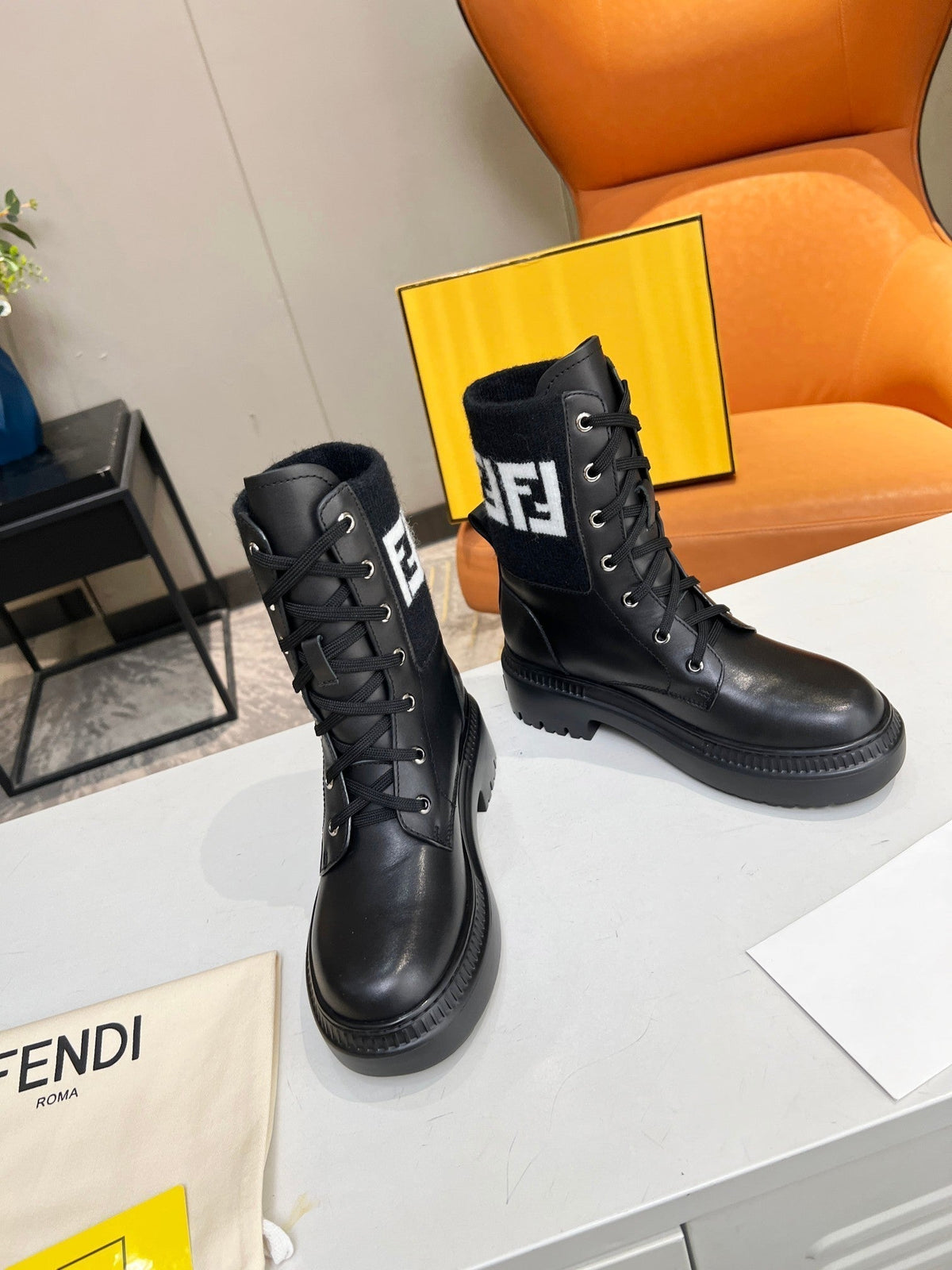 FENDI MARTIN BOOTS IN BLACK CALFSKIN AND FUR