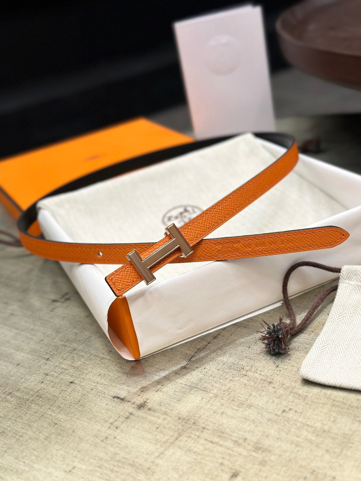 HM FOCUS BUCKLE & REVERSIBLE BLACK AND ORANGE LEATHER STRAP 13MM COPPER HARDWARE