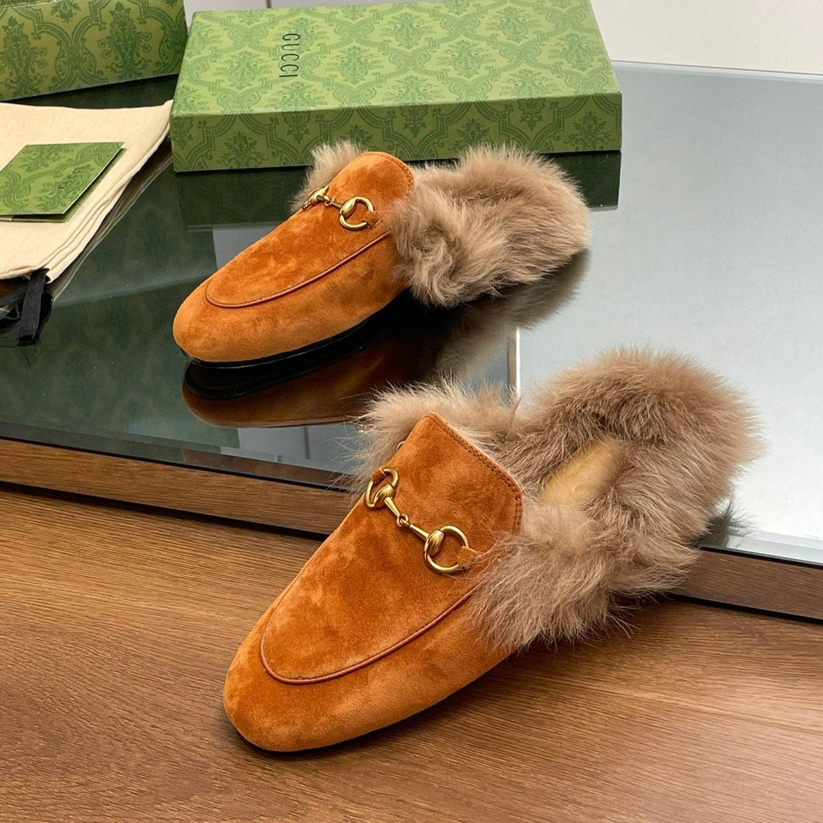 HORSEBIT MULE IN BRONZE ORANGE SUEDE AND LAMB WOOL LINING