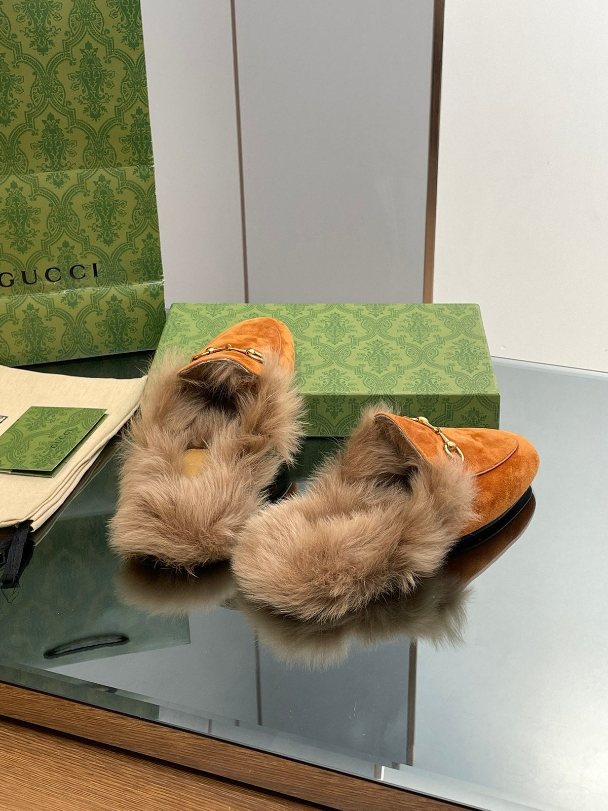 HORSEBIT MULE IN BRONZE ORANGE SUEDE AND LAMB WOOL LINING