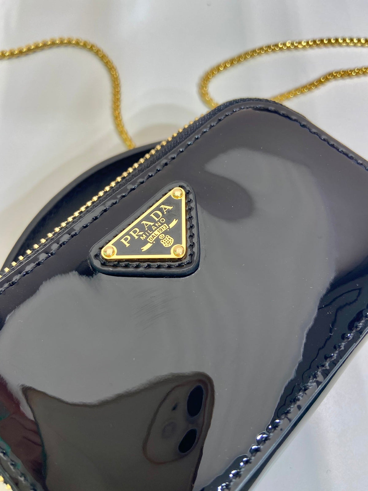MINI HAND BAG 11 WITH GOLD STRAP IN BLACK PATENT CALFSKIN