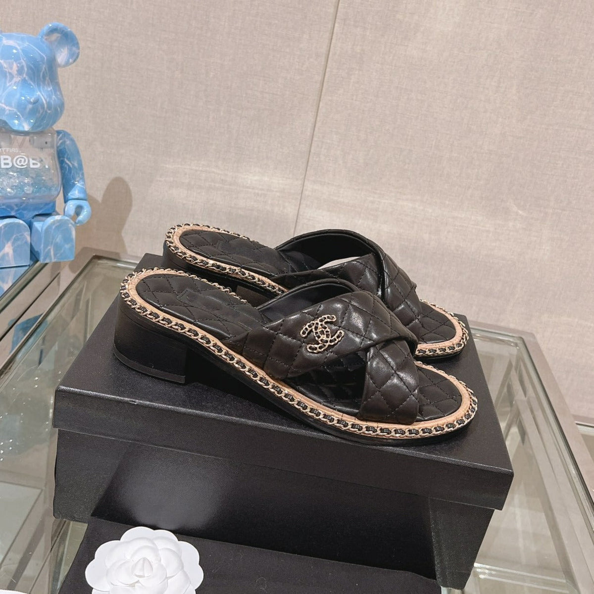 cross slippers 50 black quilted lambskin