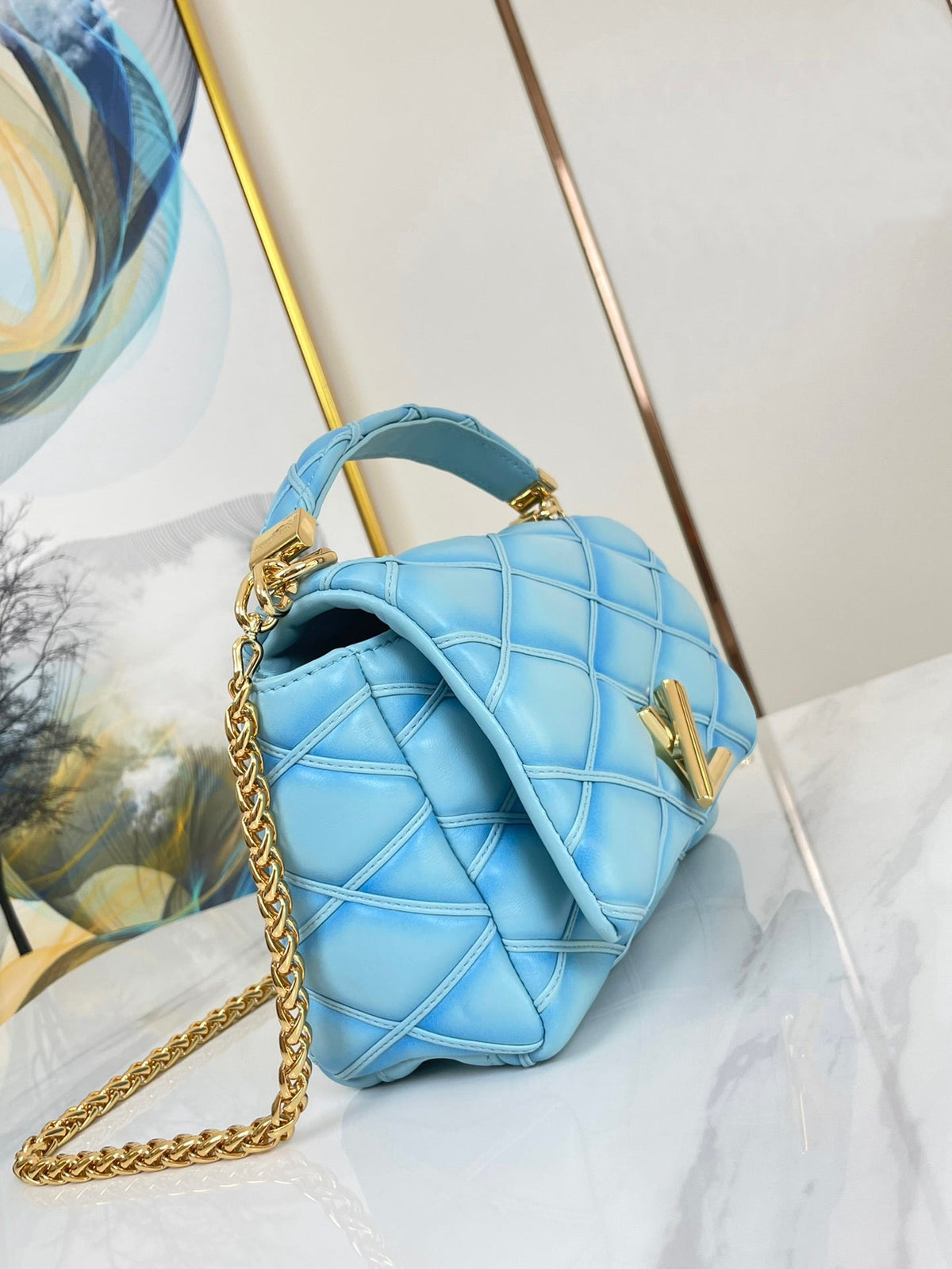 GO-14 MM 23 IN SKY BLUE QUILTED LAMBSKIN GOLD HARDWARE