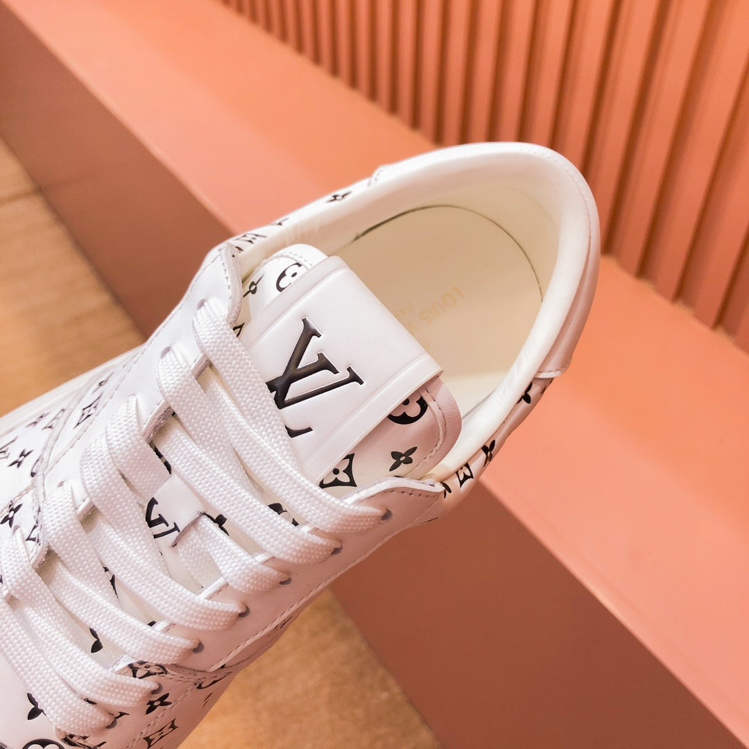 LV TRAINER SNEAKER IN WHITE MIX BLACK MONOGRAM CALFSKIN