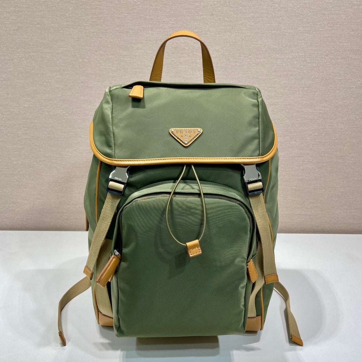 BACKPACK 45 IN SEAWEED GREEN RE-NYLON AND BROWN CALFSKIN TRIM