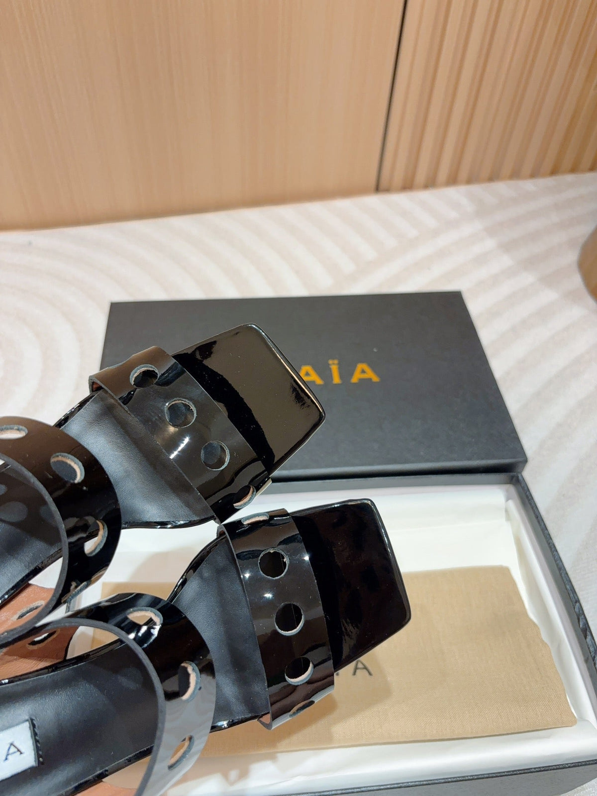 ALAIA TWO-STRAPS HIGH HEEL SANDALS IN BLACK PATENT LAMBSKIN
