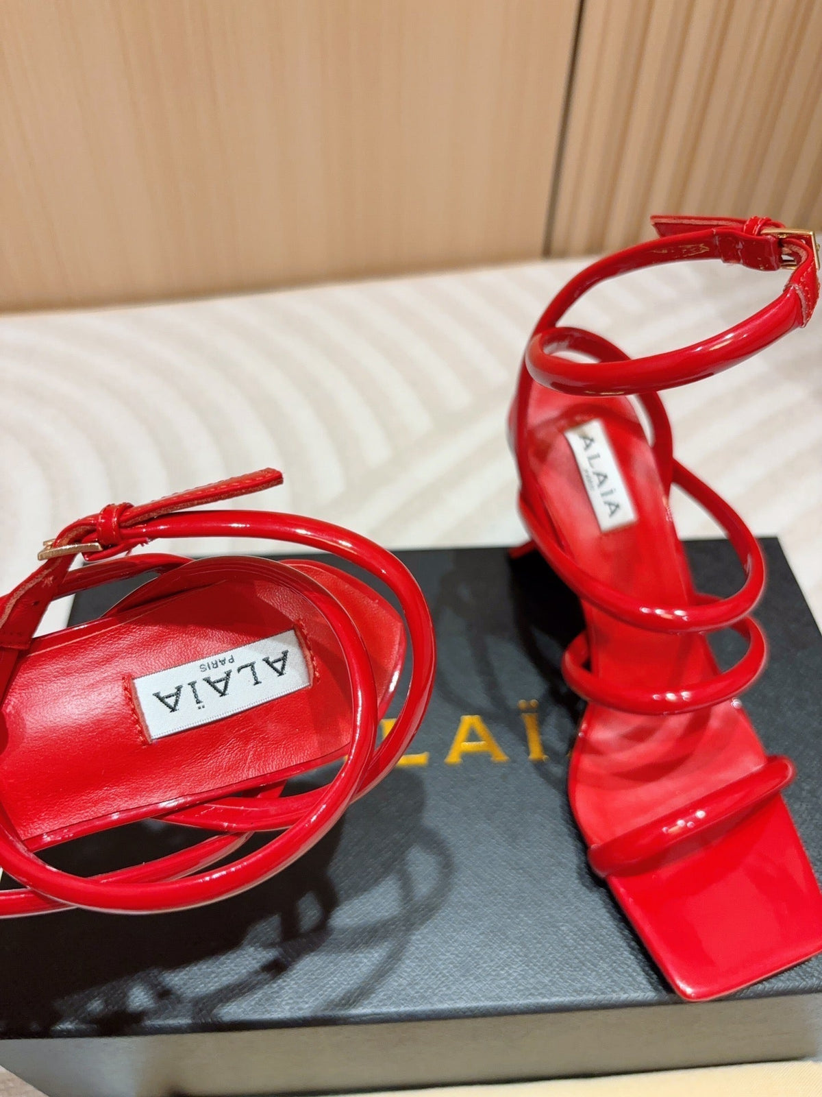 ALAIA THREE-STRAPS HIGH HEEL SANDALS IN CHERRY RED PATENT LAMBSKIN