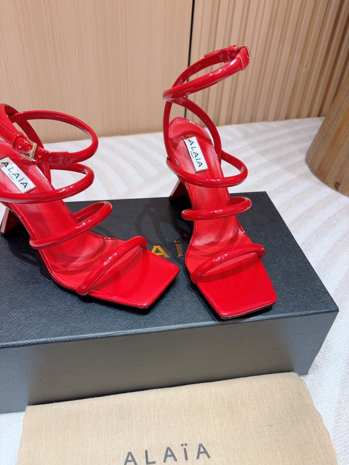 ALAIA THREE-STRAPS HIGH HEEL SANDALS IN CHERRY RED PATENT LAMBSKIN