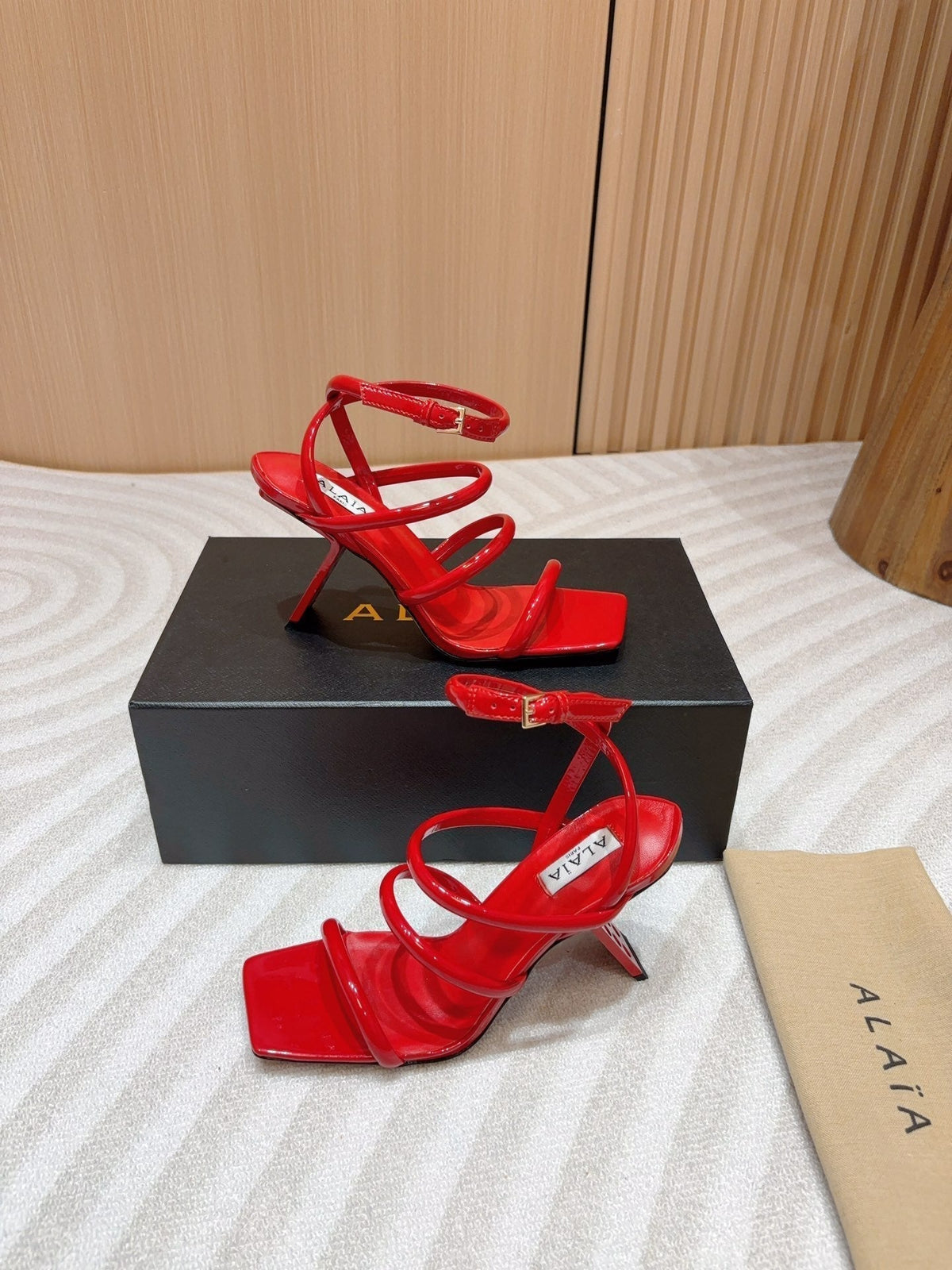 ALAIA THREE-STRAPS HIGH HEEL SANDALS IN CHERRY RED PATENT LAMBSKIN