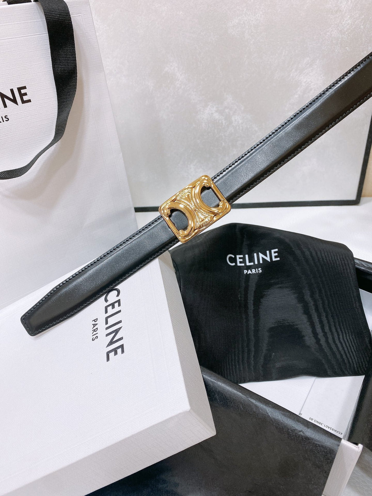 CL MEDIUM 25 MM TRIOMPHE BELT IN TAURILLON AND BLACK CALFSKIN GOLD HARDWARE