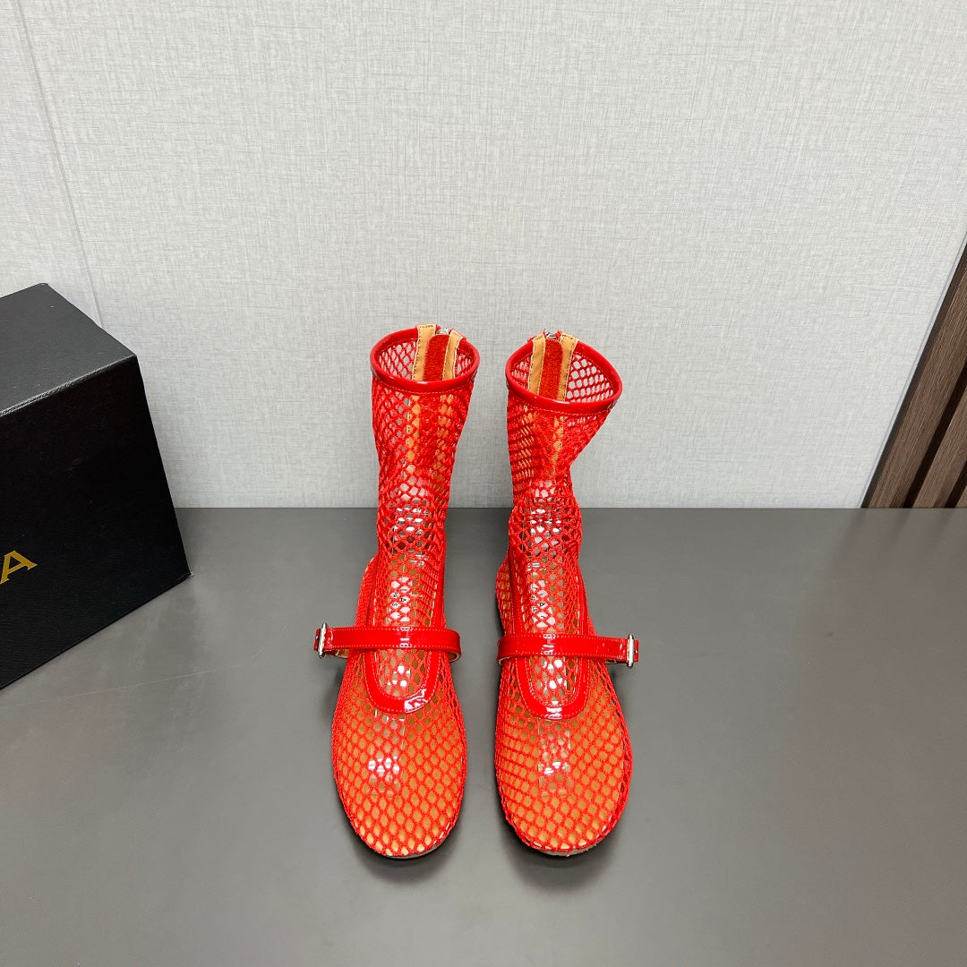 ALAIA SHORT BOOTS IN ORANGE RED MESH FISHNET