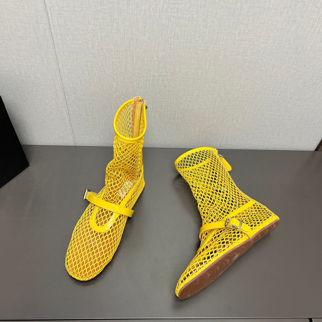 ALAIA SHORT BOOTS IN LEMON YELLOW MESH FISHNET