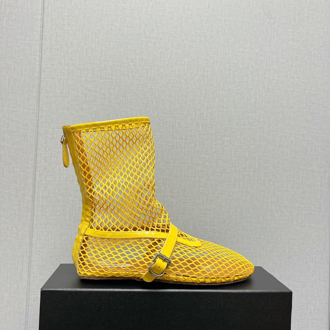 ALAIA SHORT BOOTS IN LEMON YELLOW MESH FISHNET
